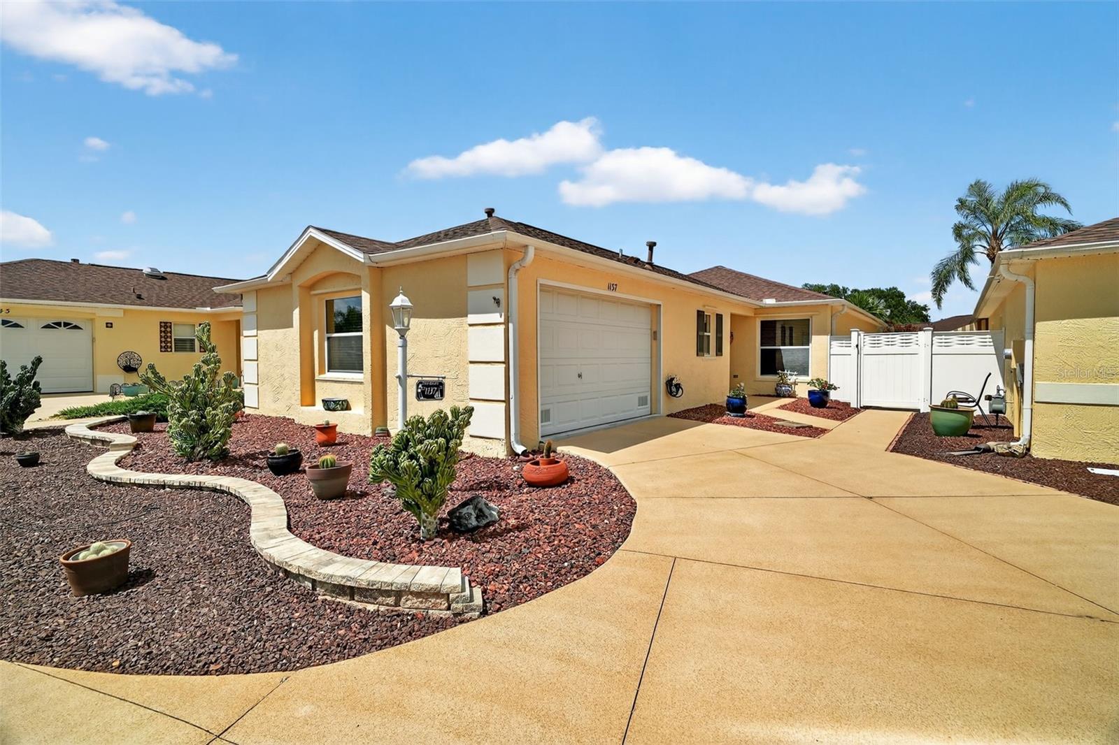 Outstanding 3/2 Foxglove Model with a Pool No BOND Located in the Prime location of the Hampton Villas Between 466 & 466A, AC & Roof 5 Yrs old Tile Flooring in all main Areas, Third Bedroom/Den Luxury Vinyl. Kitchen has Custom Laminate Counter Tops Newer SS LG Appliances Open to Dining and Living Room. Primary Bedroom has Tile flooring and In-suite Bath Enclosed Lanai Sliders to Large in-Ground Pool Bird Caged New Pool & Filter, Garage Flooring Just Painted and Parking For Car & Golf Cart. Home Walking Distance to Two Community Pool and Mail Station also between Mallory, Cane Garden CC & Lake Mona Center this home has it all some Furniture Available. Call to view this great Pool Home