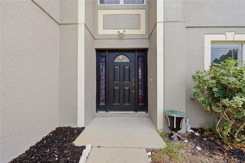 Photo of 627 Woodland Creek Boulevard, Kissimmee, FL 34744 (MLS # O6392189)