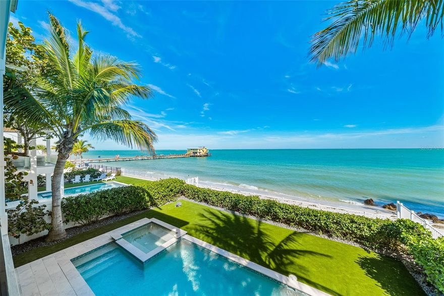 Welcome to Bay Breeze! This is one of the most exclusive homes on the North end of Anna Maria Island. The current owners occupy the house themselves 5 months a year. In the 7 months of renting, the house generated rental income of $278k in 2022 and $300k in 2023. Bay Breeze is very loved by its owners and they have kept it in the best condition over the years and replaced many fixtures. Located directly on the Bay beach and the desirable North Shore Drive, you will see breathtaking sunrises over Tampa Bay with panoramic views of the sparkling aqua blue water. This 4 bedroom, 4.5 bathroom home is luxurious, features a Key West-style that invites you to an unforgettable relaxation you cannot beat. Each bedroom has its own ensuite bathroom and walk-in closet. With over 3,000 square feet under air, and 1,500 square feet of outdoor space, this expansive, yet comfortable home, is contemporary and elegant. The floor to ceiling windows showcase the spectacular and sweeping views as well as creating an abundance of natural light and inviting atmosphere. Enjoy the expansive terraces on each floor, looking out onto the lovely and colorful sea where you will see pelican fishing and dolphin playing each day. At night, the illuminated Sunshine Skyway Bridge and the lights of St. Petersburg look beautiful in the watery distance. Bay Breeze enjoys an impressive open floor plan with space to sprawl out. Relax in the living room or den, or prepare fabulous food in a full, luxurious kitchen with stainless steel appliances that include three ovens and a wine refrigerator. An elevator to all floors is convenient for those unable to use the stairs. Decorated with beautiful furniture, the home is contemporary, yet comfortable, and, for added comfort and enjoyment, an easily programmed iPad provides the music inside and out. The ground floor of Bay Breeze is an interactive area with a large Weber gas grill, private heated swimming pool, hot tub, foosball table, ping pong table, and TV. Relax on the private beach, or pull the kayaks out for a little more adventure. Located in the heart of Anna Maria, you are a quick golf cart ride away to Pine Avenue that features many restaurants, ice cream shops, boutiques, the City Pier and more! Both air conditioners, pool heater and filter pump were recently replaced.