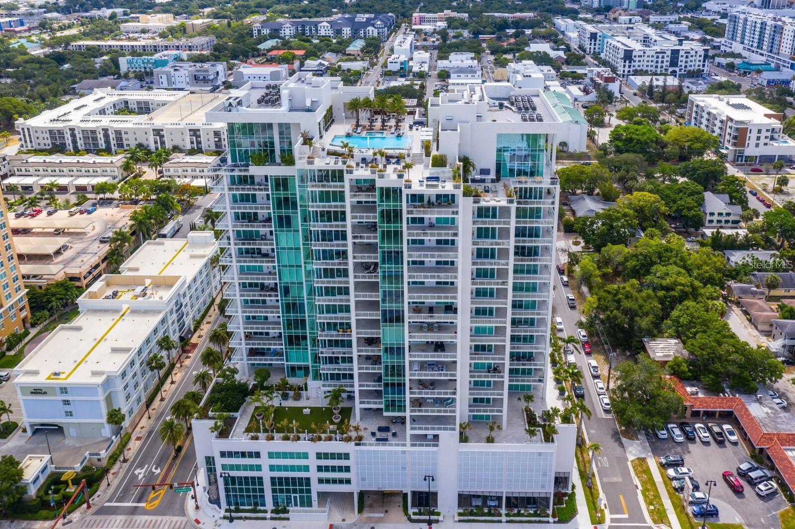 PHENOMENAL PRICE AND BEST DOWNTOWN VALUE FOR THIS LUXURY CONDO IN THE BLVD SARASOTA WITH PANORAMIC BAY AND CITY SKYLINE VIEWS FEATURING INCREDIBLE DESIGNER UPGRADES, LOCATION IN THE DESIRED 02 STACK WITH UNOBSTRUCTED WEST AND NORTH BAY VIEWS, AND 3962 SF OPEN FLOOR PLAN. This gorgeous condominium has over $350,000 in custom upgrades! Welcome to your luxury retreat and enjoy spectacular sunrises and sunsets framed by floor-to-ceiling impact windows and a 12-foot sliding glass door. Your private access elevator opens into an expansive open-concept living area and chef’s state-of-the-art kitchen customized by the owner with Caesarstone Quartz waterfall island and countertops, high-quality Thermador appliances including natural gas 6-burner gas range with griddle, dual ovens, custom wet bar with Elkay martini glass sink, Subzero wine fridge, and Scotsman icemaker, and enlarged pantry. Custom cabinetry, chic Italian tile backsplash, and designer lighting add sophistication throughout. Three oversized bedroom suites each have private terrace access and spa-like baths. The primary bedroom includes dual California closets, built-in wall unit with beverage center, walk-in soaking tub, floating vanities, and a massive glass and tile dual-head shower. A powder room and laundry with sink and Electrolux appliances round out the interior. Outfitted by Wicked Smart Homes, the condo features a state-of-the art system with Lutron lighting, motorized shades, full Sonos surround sound system, and smart automation. Additional highlights include three glass-railed terraces, custom lighting, 8' solid-core doors with decorative glass inlays, and premium finishes throughout. This unit includes two premium secure parking spaces, a private climate-controlled storage locker, and the opportunity to purchase a rare 625' hobby room/2-car garage with water and internet capability (available separately). BLVD offers unmatched amenities: rooftop infinity pool and kitchen, concierge, fitness center, wine cellar with private lockers, golf simulator, lounge, pet lawn, conference room, and building-wide water softener. Elevator access to the members-only club 1000 North opening late 2025 completes the package. Live in the heart of the Rosemary District of Downtown Sarasota, just minutes from Siesta Key, St. Armands and all that Sarasota has to offer. Don’t miss this amazing opportunity!