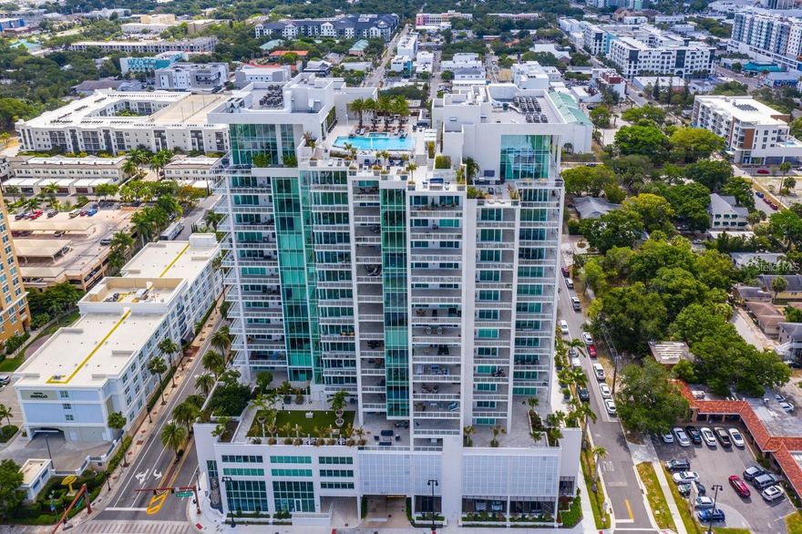 One or more photo(s) has been virtually staged. WHY WAIT FOR NEW CONSTRUCTION WHEN YOU CAN MOVE RIGHT IN TO THIS PHENOMENAL 3962 SF LUXURY CONDO, THE BEST DOWNTOWN SARASOTA VALUE, IN THE INCREDIBLY AMENITIZED BLVD, FEATURING PANORAMIC UNOBSTRUCTED WEST AND NORTH BAY VIEWS PLUS CITY SKYLINE VIEWS, AND BEAUTIFUL DESIGNER UPGRADES. Located in the desired 02 stack, this gorgeous condominium has over $350,000 in custom upgrades and enjoys spectacular sunrises and sunsets framed by floor-to-ceiling impact windows and a pocketing 12-foot sliding glass door providing a seamless connection between the indoor and outdoor spaces. Your private access elevator opens into an expansive open-concept living area and chef’s state-of-the-art kitchen customized with Caesarstone Quartz waterfall island and countertops and cutting-edge Porcelanosa backsplash, high-quality Thermador appliances including natural gas 6-burner range with griddle, dual ovens, custom wet bar with Elkay martini glass sink, Subzero wine fridge, Scotsman icemaker, and enlarged pantry. Custom cabinetry and designer lighting add sophistication throughout. Three oversized bedroom suites each have private terrace access, lux spa-like baths and large walk-in closets. The expansive primary bedroom with soaring coffered ceiling includes dual California closets, built-in custom wall unit with beverage center, walk-in soaking tub, floating vanities, and a glass and tile dual-head shower. A lovely powder room and spacious laundry room with Electrolux appliances round out the interior. Outfitted by Wicked Smart Homes, the condo features a state-of-the art smart automation system with Lutron lighting, motorized shades, and full Sonos surround sound system. Additional highlights include three glass-railed terraces, custom lighting, 8' solid-core doors with decorative glass inlays, and premium finishes throughout. This unit includes two premium secure parking spaces and a private climate-controlled storage locker. BLVD offers unmatched amenities: spectacular rooftop with infinity-edge pool/spa, fire bowls and covered grill area, concierge and on-site manager, state-of-the-art fitness center, wine cellar with private lockers, golf simulator, lounge with catering kitchen and pool table, pet lawn and dog grooming salon, conference room, and building-wide water softener. Elevator access to the private members-only club 1000 North opening soon completes the package. Live in the heart of the Rosemary District of Downtown Sarasota, just minutes from Siesta Key, St. Armands and all that Sarasota has to offer. Don’t miss this amazing opportunity