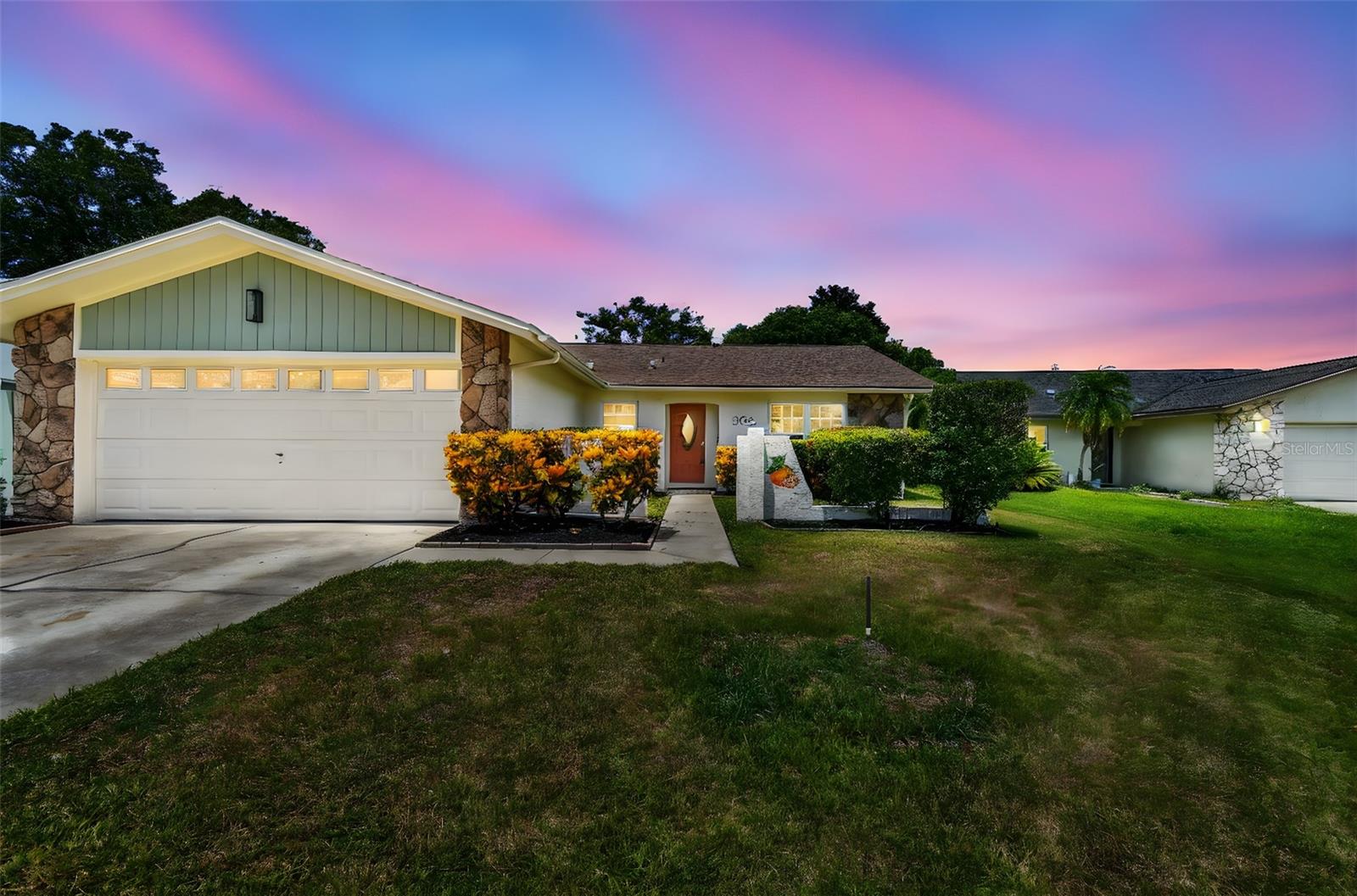 Completely Remodeled pool home in prime Dunedin location! Welcome to this beautifully updated 3-bedroom, 2-bath, 2-car garage, pool home tucked away on a quiet cul-de-sac, just minutes from vibrant downtown Dunedin and the Gulf beaches. Located in a golf cart friendly community. Step into the light and bright main living area featuring luxury vinyl plank flooring. The stunning kitchen boasts quartz countertops, soft close cabinetry, stainless steel appliances, a beautiful tile backsplash, range hood, and a butler's pantry with wine fridge-perfect for entertaining. Additional upgrades include fresh interior and exterior paint, updated lighting and ceiling fans, and removed pop corn ceilings for a clean, modern look. Both bathrooms have been tastefully updated, and there is a inside laundry room for convenience. The pool area is screened in and was recently resurfaced (2025), Brand new water heater (2025), Updated electrical panel (2025), AC (2018), Roof (2016). This home sits high and dry-no flood insurance required-and had no flooding or damage from last year's storms. The screened-in pool area is perfect for relaxing or entertaining, Easy access to Dining, Shopping, Entertainment, and just 30 minutes to Tampa International Airport, this home offers the best of Dunedin living. Don't miss your chance to own this move-in ready gem in one of the area's most desirable locations!