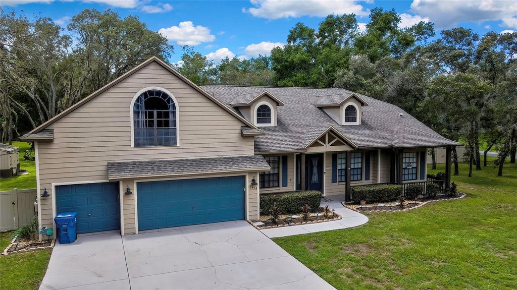 Photo of 13456 Cooper Road, Spring Hill, FL 34609 (MLS # TB8417957)