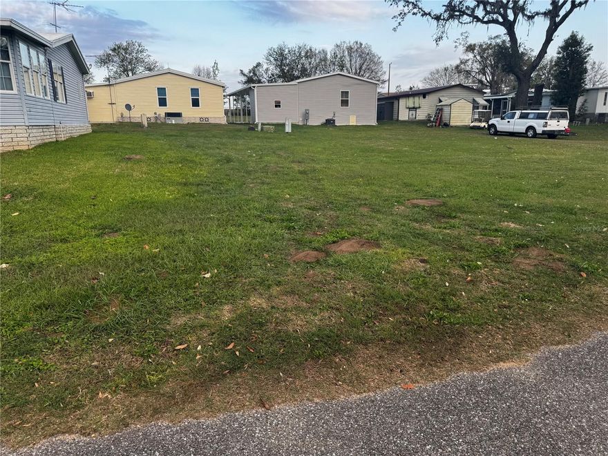 Build your retirement retreat on this vacant lot in a welcoming 55+ community in sunny Florida. This gated community makes it possible for you to own your own land and enjoy great amenities. Relax at the pool, mingle at the clubhouse, or stroll with your pet in our spacious dog park. This community is nestled away from all the rushing city traffic but still conveniently located to a beautiful and charming Dade City.