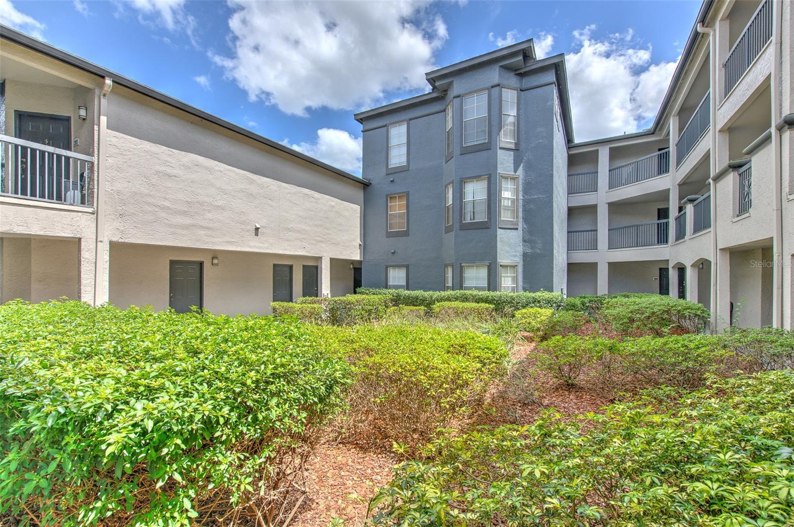 Price reduced! Best priced cozy 2nd floor condo with instant cash flow or live in the highly desirable community in the heart of Temple Terrace! This one bedroom/one bathroom 2nd floor condo features a nice open living space, a custom-built in-wall entertainment center, laundry room and a storage unit in the hallway. There is no balcony but there is extra sitting area with three large windows overlooking the beautiful courtyard! The condo fee includes water and sewer and valet trash collection! Washer and dryer will stay in the unit.
Located minutes away from the VA Hospital, Moffitt Cancer Center, Advent Health, Shriners Health Care, Medical Facilities, USF Main Campus, USF Health, Parks, Shopping, and Busch Gardens Theme Park with easy access to I-75 and I-275. The Community has wonderful Landscape grounds, 2 Pools, a Club House, Fitness Center, Beach Volleyball Court, Tennis Courts, and a carwash area. Perfect property for first time home buyer or add to your investment portfolio as there is a great tenant in place!
