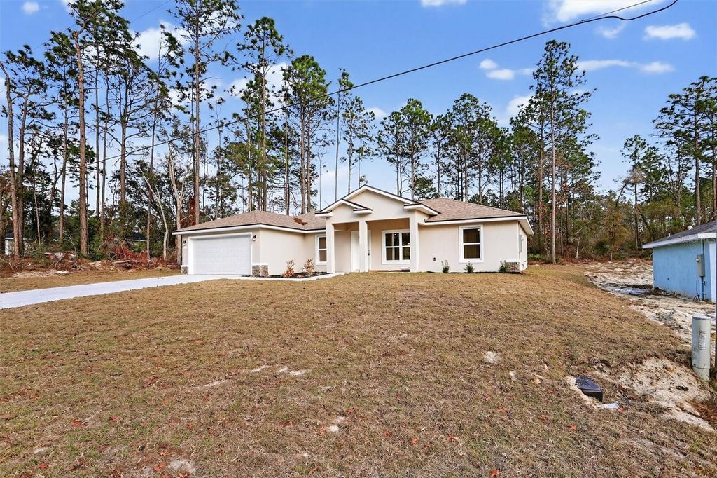 Photo of 8927 N Barbados Way, Citrus Springs, FL 34433 (MLS # OM716777)