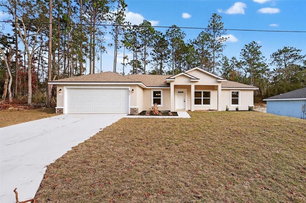 Photo of 8927 N Barbados Way, Citrus Springs, FL 34433 (MLS # OM716777)