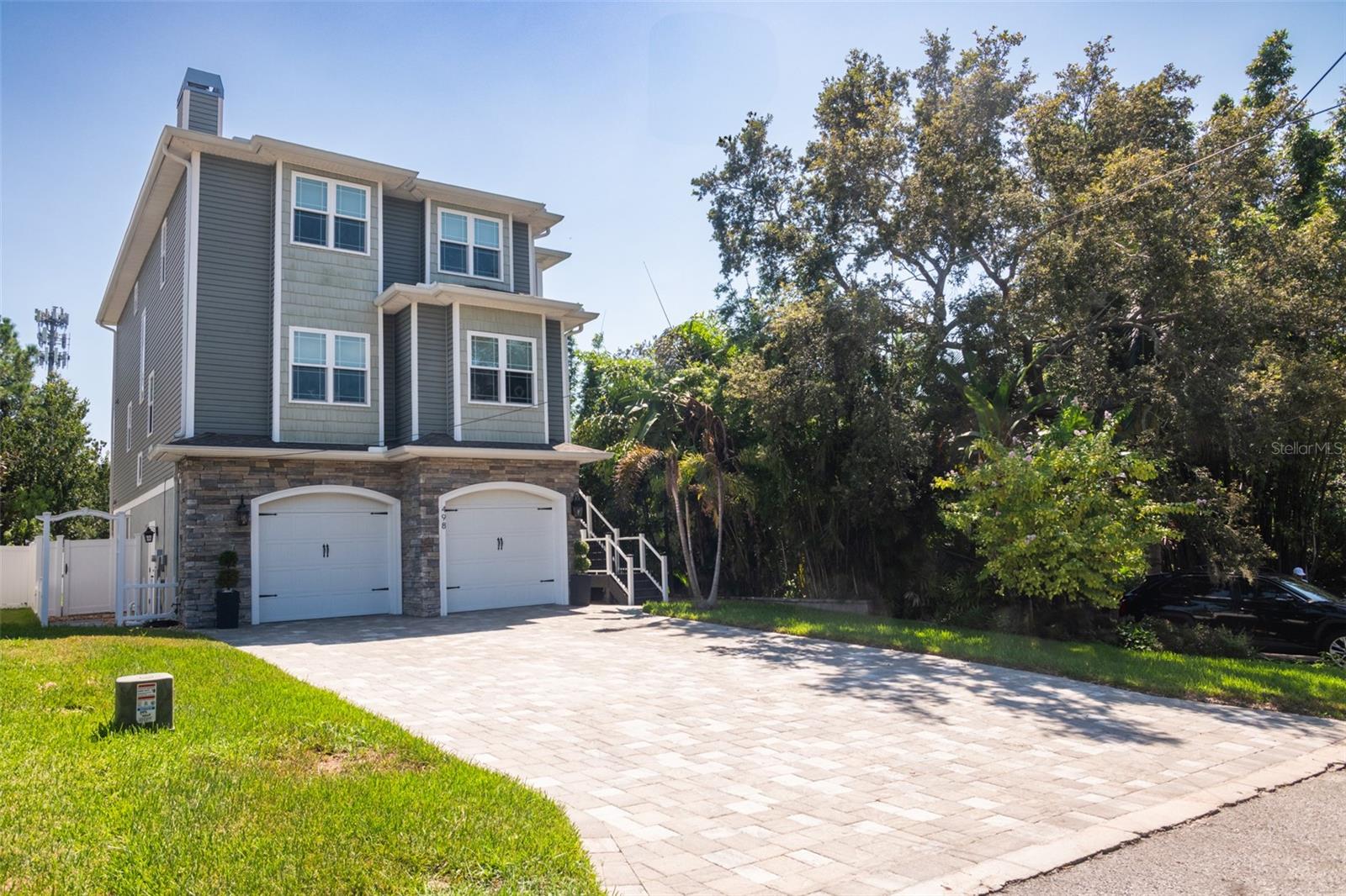 Welcome to 498 Magnolia Avenue, where a slice of heaven meets luxury in the heart of Palm Harbor. This stunning 4-bedroom, 4-bathroom home offers the perfect blend of elegance and comfort with a bright open floor plan designed for both relaxation and entertaining. The spacious living areas flow seamlessly into a modern kitchen featuring upgraded appliances, quality cabinetry, and generous counter space.
Each bedroom is paired with its own full bathroom, providing privacy and convenience throughout the home. The primary suite is a true retreat with a spa-like bath, walk-in closet, and private balcony. Two additional balconies invite you to relax and take in the peaceful surroundings, while the oversized two-car garage provides plenty of room to accommodate all your toys.
Perfectly located just 5 minutes from downtown Palm Harbor and 10 minutes from the historic Sponge Docks of Tarpon Springs, this residence combines comfort, functionality, and an unbeatable location for the ultimate Gulf Coast lifestyle. (No HOA and No Flood Insurance required!)