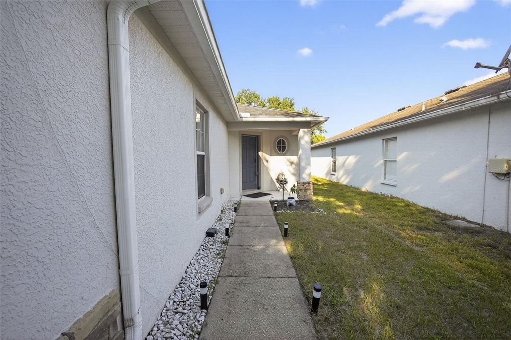 Photo of 10047 Landport Way, Land O Lakes, FL 34638 (MLS # TB8425231)