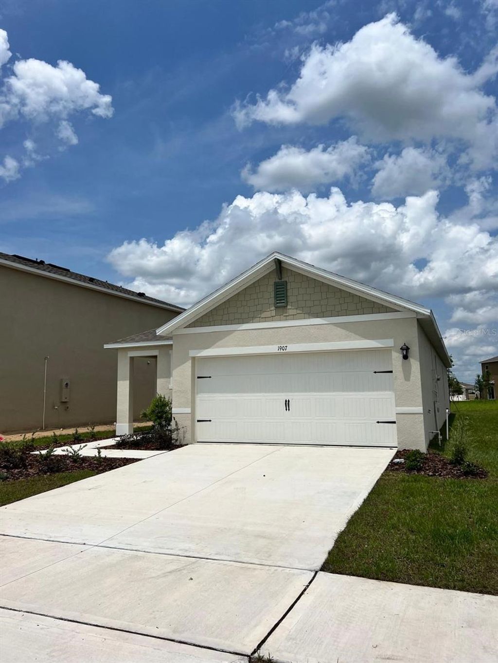 Photo of 1907 Elkridge Street, Davenport, FL 33837 (MLS # O6406778)