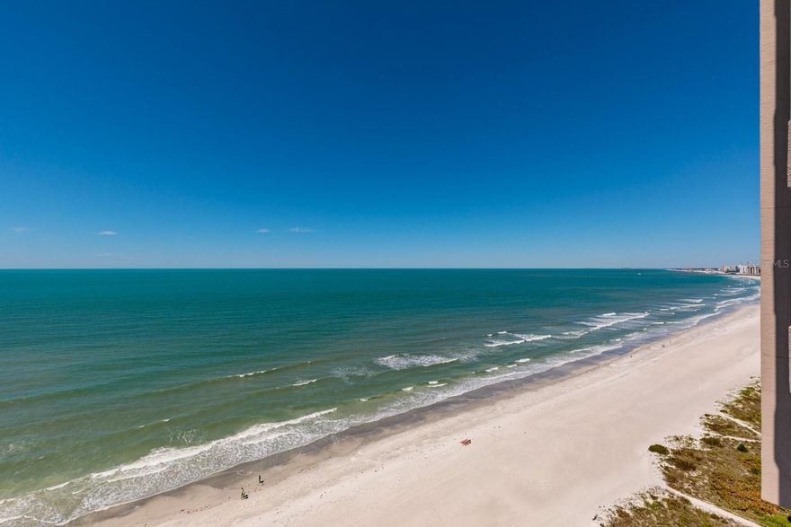 2-STORY PENTHOUSE at the ULTIMAR ON SAND KEY WITH SPECTACULAR VIEWS TO THE NORTH & WEST!!  See all the way to Honeymoon Island, Dunedin & beyond. 2-Story Wal to Wall & Ceiling to Floor Window Wall affords Panoramic Views of the sunset over the Gulf & Fantastic Views of the Intracoastal with nighttime lights. Sit on one of your 3 balconies having a cool drink enjoying the tropical breezes while watching the dolphins at play! Watch the fabulous fireworks over Clearwater Harbor from your balconies. Breathtaking views from all rooms are unobstructed & private. Bi-Level Penthouse has semi-private foyer & elevator. 2 Master Suites plus a 3rd bedroom with a bath across the hall.   Stunning open floating  staircase to upper level that is a luxurious Master Bedroom with sitting area and private balcony.   Also a dressing area between his & her closets with a round skylight.  Separate his & her bathrooms.  Hers has a spacious shower & free standing soaking tub.  Large vanity with lots of storage.  His bath has a huge marble shower & separate vanity.  2nd level also has a loft area perfect for a den or office and separate full laundry room. Private foyer on 2nd floor with access to semi-private elevator.  Travertine Marble floors in 1st floor foyer,, living/dining area, kitchen, casual dining area and hallway.  Wood floors in other areas.   Remodeled kitchen includes open bar area with top of the line stainless steel appliances, cherry cabinets & granite counter tops. Casual dining area off kitchen with a complete bar area including wine refrigerator to match kitchen.  Private oversized 4-car garage with 1 bay for storage area, within the parking garage. The Ultimar is a world class condo complex on Sand Key of famous Clearwater Beach. Miles of pure white sand. Lush tropical landscaped grounds are expertly maintained. 24 hr guard gated. True Resort Style complex has 3 geo thermal heated pools w/spas, 3 tennis courts, pickle ball, basketball court, putting green, croquet lawn, grill area, firepit area, shuffleboard, corn hole, gym, steam & sauna, billiards rm, media rm, social rm with catering kitchen and baby grand piano. Walk to great restaurants & shops or catch the Beach Trolley right out in front of the building. A short drive to Tampa & the airport plus all of the sports venues of our championship teams. START LIVING THE FLORIDA BEACH LIFESTYLE TODAY!! Buyer to verify room dimensions. Sold furnished.
