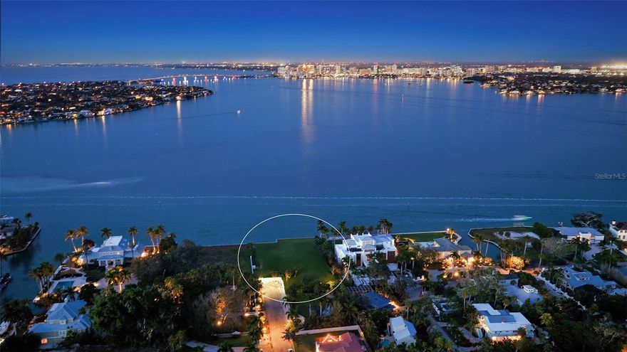 A rare and distinguished offering of 1.12 acres directly on the sparkling shore of Big Pass on Siesta Key, FL. This legacy estate on coveted Flamingo Avenue is a unique parcel at the north end of this most desirable address, and one of the most extraordinary properties available on Florida’s Gulf Coast. 3401 Flamingo Avenue exemplifies waterfront living at its finest. 

The property enjoys 150’ of wide deep-water frontage, a coveted boathouse in a protected inlet that accommodates two boats, plus a large dockage structure for a yacht (currently being repaired). Given the direct Gulf and Sarasota Bay access, this is an ideal property for the consummate boater, whether a fisherman, water sports enthusiast, day- or overnight tripper, or prefer the easy cruising or sailing lifestyle, this is the ultimate location for any boating enthusiast.

Owners will revel in the glistening Gulf of Mexico and Sarasota Bay waters, enjoy watching boaters gliding through Big Pass, and marvel at the plethora of marine life from every vantage point. These views are the perfect frame to savor the captivating sunsets over the Gulf, picturesque downtown Sarasota skyline and Bird Key, and pristine shifting sands of nearby sand bars.

This walled and gated oversized bayfront property offers not just endless possibilities for your new estate home, but also space for amenities such as gardens, tennis and/or pickle ball court, separate guest house, and of course a waterfront pool. The current structure is not habitable, and a quote for demolition is available upon request. 

Here you’re not just buying a property, you are creating your own magnificent home, lifestyle, and legacy. 

Located just minutes away from the center of famed Siesta Key’s dining, shopping, and nightlife, and a short ride to enjoy the cultural amenities, galleries, fine dining, and vibrant Sarasota downtown community. Many of the photos have had the house virtually removed.