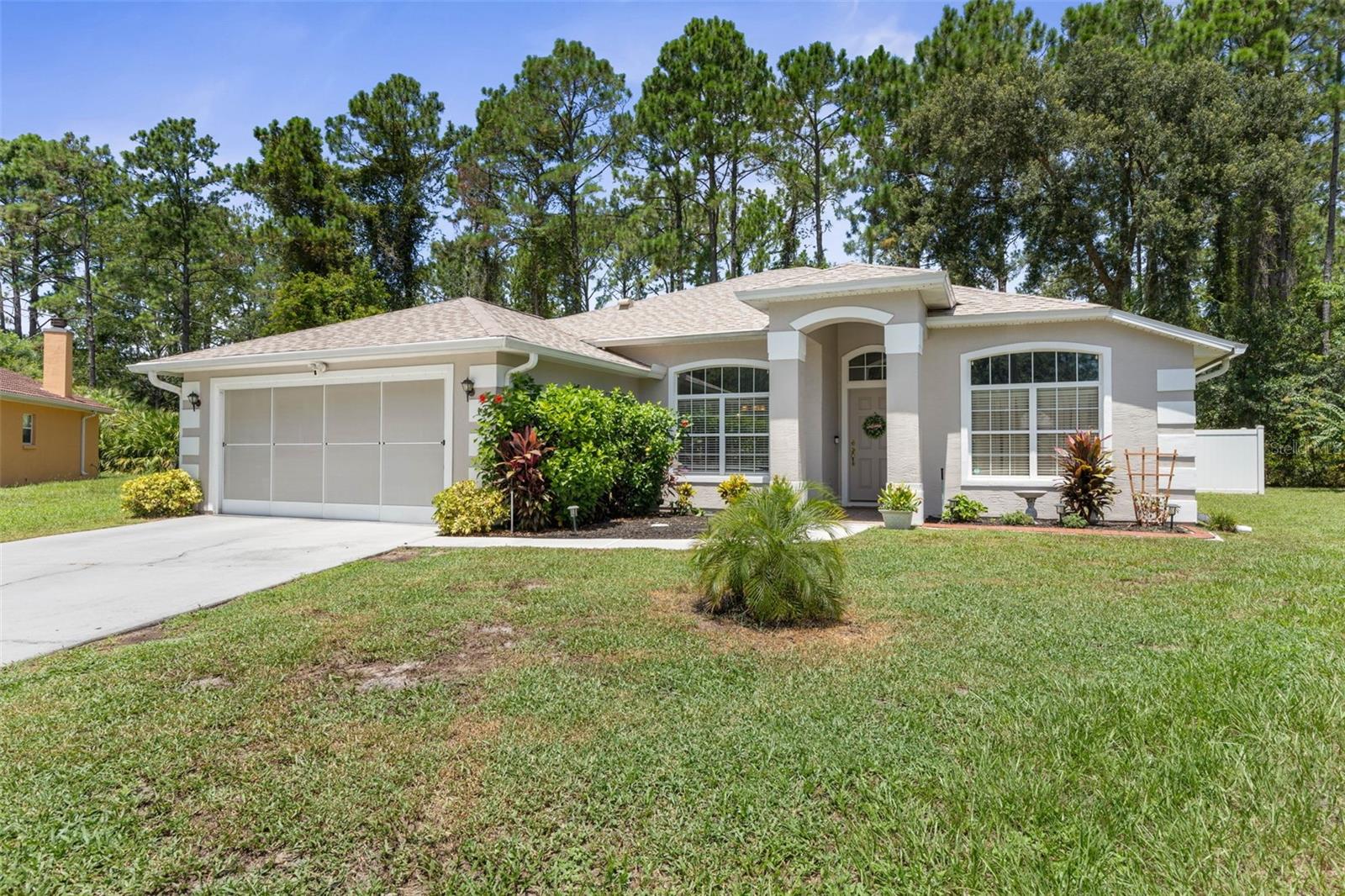 This charming 4-bedroom, 2-bathroom, 2-car garage home is a perfect blend of comfort and convenience, ideally situated on a quiet cul-de-sac in Palm Coast’s desirable Belle Terre neighborhood. This home offers a peaceful and private setting, with easy access to schools, recreational fields, shopping, and restaurants. Step inside to a home that has been meticulously maintained and recently updated. Fresh interior and exterior paint provide a bright and welcoming feel. The kitchen is a true highlight, featuring beautiful new granite countertops. The primary bathroom has been thoughtfully renovated to include a spacious, modern walk-in shower. The fourth bedroom has French doors, offering a flexible space that could be used as a home office, playroom, or guest room. Enjoy the Florida lifestyle on the screened-in back porch overlooking the fenced backyard. A dedicated storage shed provides extra space for all your outdoor needs. This home is equipped with a new roof (2025), a new AC system (2024), a water softener system, and irrigation, offering peace of mind and low maintenance. With motivated sellers, this is an excellent opportunity to own a meticulously cared-for home in a desirable Palm Coast location. No HOA.