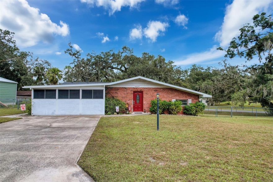 NO HOA! NO CDD!! Bring your toys to this spacious .39-acre corner lot with a fenced yard! This 3-bedroom, 2-bath pool home offers peace of mind with major updates already done, including a NEW roof (2024), NEW water heater (2025), and an HVAC system only 5 years old. Enjoy a thoughtfully designed floor plan that offers both openness and separation of space, featuring a separate dining room, family room, and living room. The oversized Florida room with a built-in A/C provides year-round enjoyment, while the screened-in pool and well-maintained patio create a backyard oasis ideal for relaxation or fun in the sun! Your new home offers the tranquility of rural living, peacefully tucked away in a country setting, while being conveniently located near recreation, shopping, and restaurants, including one of Florida's few drive-in theaters. Withlacoochee River Park, a scenic 406-acre park offering trails for hiking, biking, and horseback riding with river access, is a short drive away to enhance your love of the outdoors. Don't miss out on this opportunity to embrace the country life you've been dreaming of while still enjoying easy access to urban amenities.