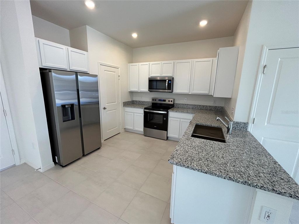 Photo of 718 Overpool Avenue, Davenport, FL 33896 (MLS # S5139604)