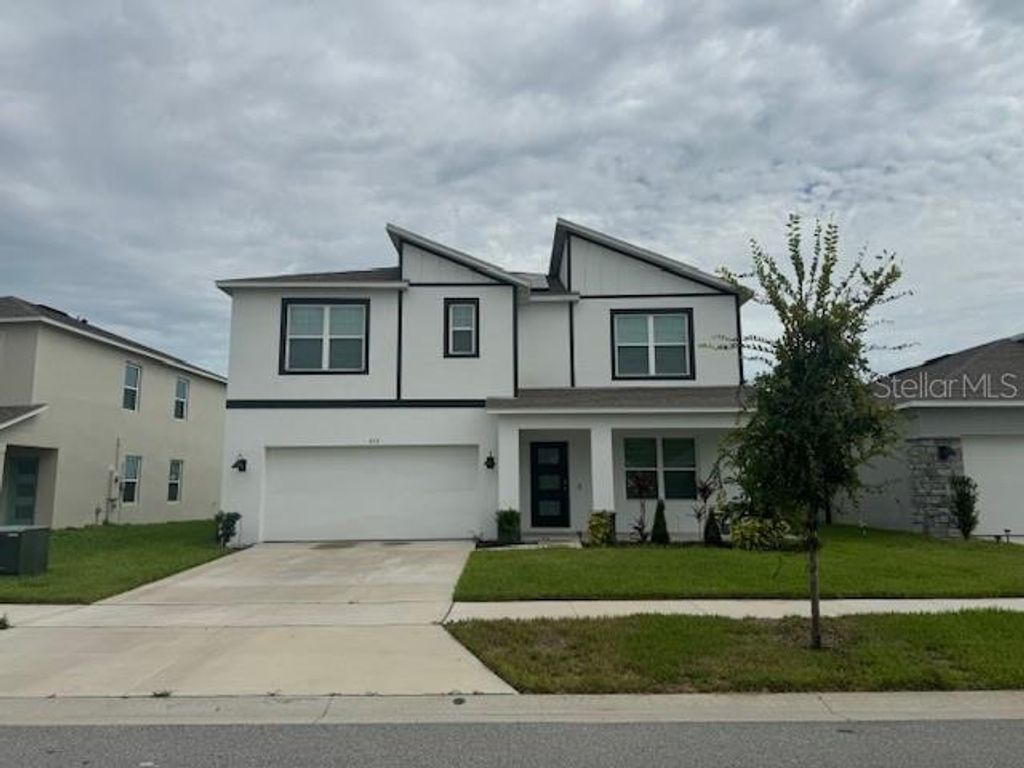 Photo of 313 Talisi Loop, Saint Cloud, FL 34771 (MLS # O6370180)