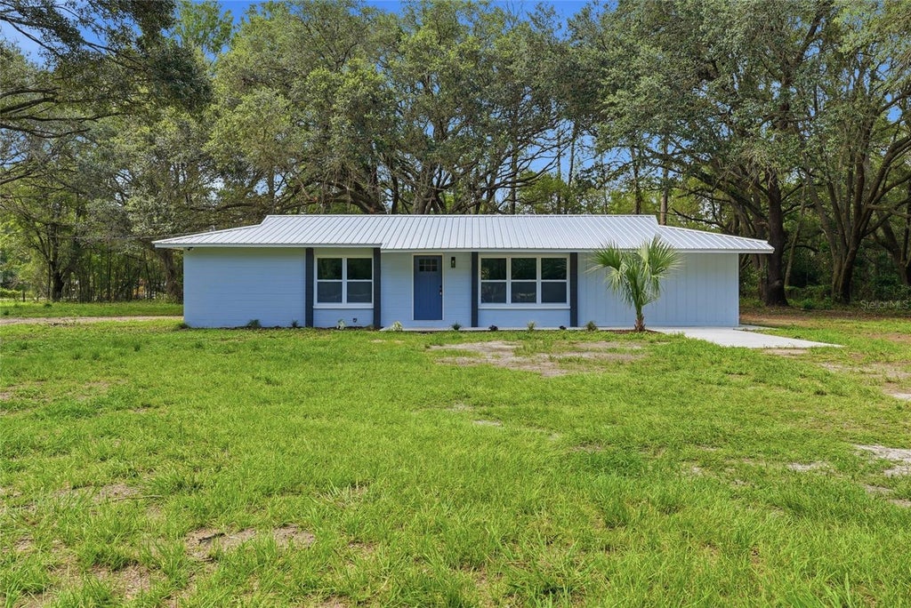 Photo of 20110 NW County Road 2054, Alachua, FL 32615 (MLS # GC541522)