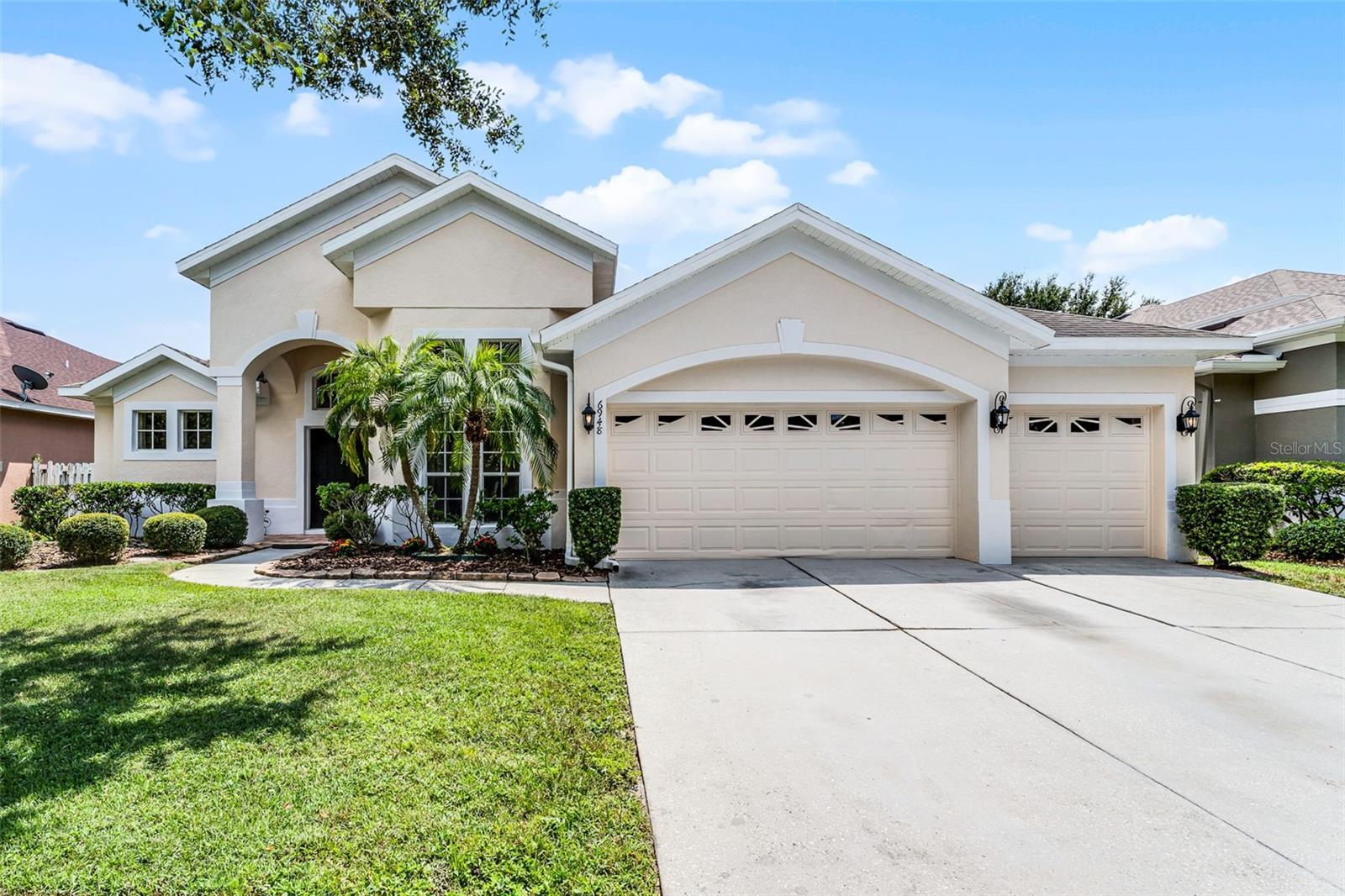 Welcome to this beautifully updated home, nestled in the exclusive gated community of Vista Lakes. From the moment you step inside, you're greeted by an abundance of natural light that highlights the home’s refined finishes and thoughtful design details.
With over 2,800 square feet of living space, this home has been recently refreshed with new interior and exterior paint, plush new carpet, and a updated gourmet kitchen. The kitchen features granite countertops, 42" cabinets, a breakfast bar, and a breakfast nook—perfect for casual dining. Designed for both entertaining and everyday comfort, the open floor plan includes formal living and dining areas, along with a spacious family room centered around an electric fireplace—ideal for relaxing evenings.
The private primary suite offers direct access to the lanai, a custom walk-in closet, and a en-suite bath with dual vanities, a walk-in shower, and a garden tub for ultimate relaxation.
Step outside to a large, fenced backyard and covered patio—perfect for quiet mornings, weekend barbecues, or lively gatherings.
Vista Lakes is a vibrant, resort-style community offering an array of amenities, including multiple pools, a fitness center, tennis courts, parks, playgrounds, and scenic walking trails. All this, just minutes from Orlando International Airport (MCO), Lake Nona’s Medical City, major highways (528 & 417), and world-famous attractions.