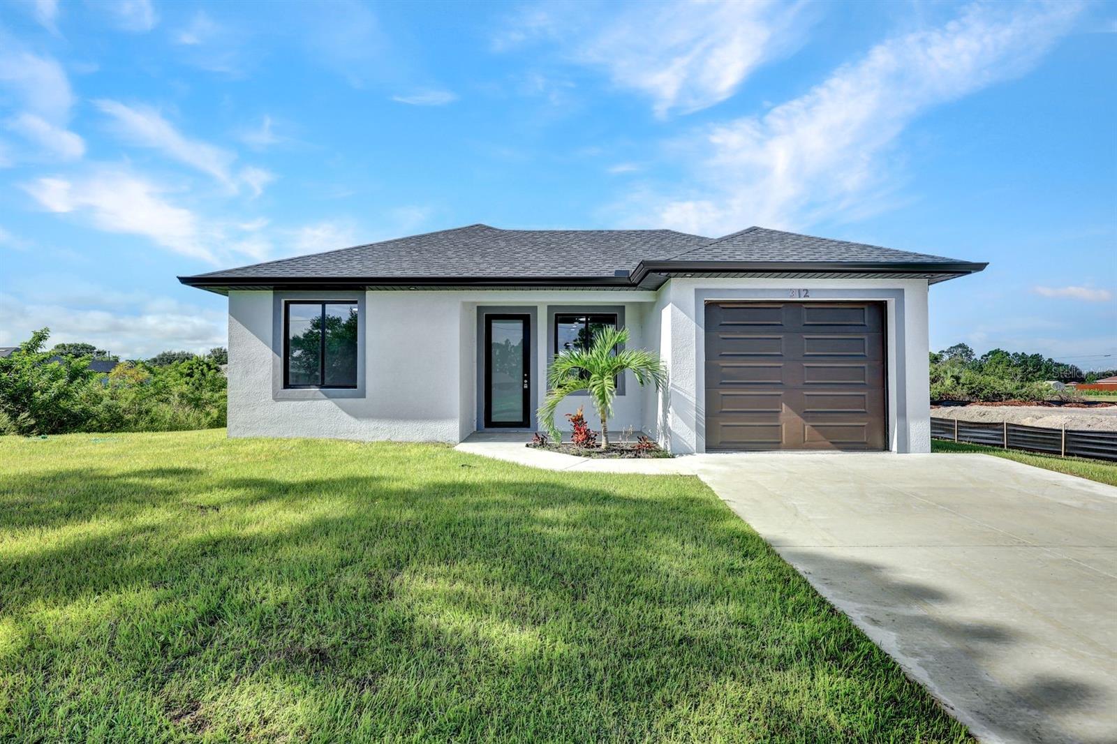 Luxury is the best way to describe this beautiful BRAND NEW 2025 home. 3 bedrooms 2 bathrooms home with a 1 car garage. Kitchen and bathrooms have granite counter tops, Main bathroom has shower only 2nd bathroom has tub shower combination. Epoxied Garage floor is ready for all your toys, long driveway can accommodate several cars. Lanai/patio floor is nicely tiled. Property has sprinklers throughout to keep your plants and grass perfectly green throughout the year.