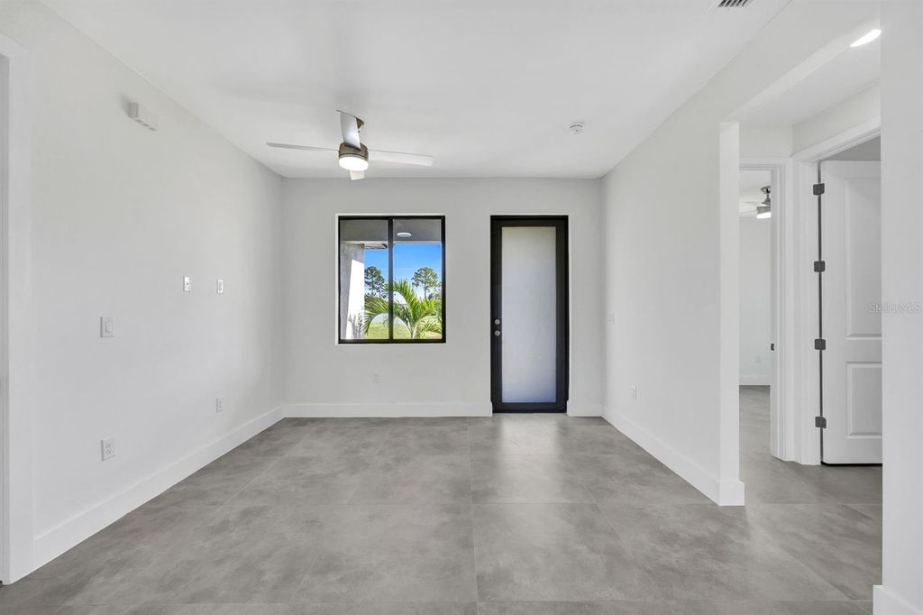 Photo of 312 Progress Avenue, Lehigh Acres, FL 33974 (MLS # TB8436549)