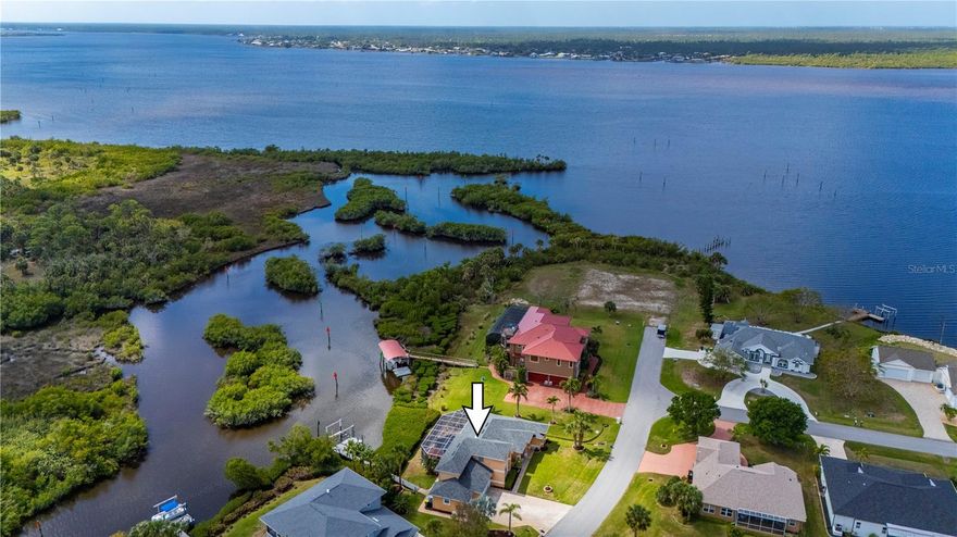 Welcome to 1356 Tremont Ter!  Spacious Two-Story Custom Waterfront Pool Home with Direct access to the Beautiful Myakka River, Boating and Fishing are mere moments away from your Boat Dock, that offers a 10,000lb Boat Lift, plus enjoy the Tranquil Water views from your Pool Deck along with the Views the upstairs Balcony offers. This Beautiful Custom Home Features 2,750+ sq. feet of Air Conditioned Living space, Three (3) Bedrooms, Three (3) Full Baths with a Pool Half Bath, Three (3) Car Garage, Volume Ceilings, Tray Ceilings, Great Room with Separate Formal Dining Room, Spacious and Open Kitchen with Stainless Steel Appliances, Expansive Breakfast Bar and Breakfast Nook overlooking the Covered Lanai and Pool, Granite Countertops, Wood Cabinetry, Laundry Room with additional storage and utility sink, Full Guest Bath is located downstairs along with a Private Primary Suite with access to the Lanai and Pool, Primary en-suite offers Separate Vanities, Walk in Shower and Separate Jetted Tub, Water Closet, His and Her Walk in Closets, the Upstairs presents Two (2) Guest Rooms, Full Guest Bath and a Loft area with Balcony overlooking the Pool and gives way to amazing Water Views, this would be an Ideal area for an Executive Home Office, Den/Study or possible 4th Bedroom. Incorporate the Screened Lanai and Heated Pool area for more Living Space, Perfect to Entertain Family and Friends year around. This Stunning Home Embraces the Waterfront Lifestyle you have been looking for, your will have 81ft of Waterfrontage giving access to the Myakka River, Charlotte Harbor and onto the Gulf enjoy World Class Boating, Fishing, Gulf Beaches, plus you will be within a short drive to Shopping, Dining, and all that Southwest Florida Offers. Come take Tour of your New Home.
