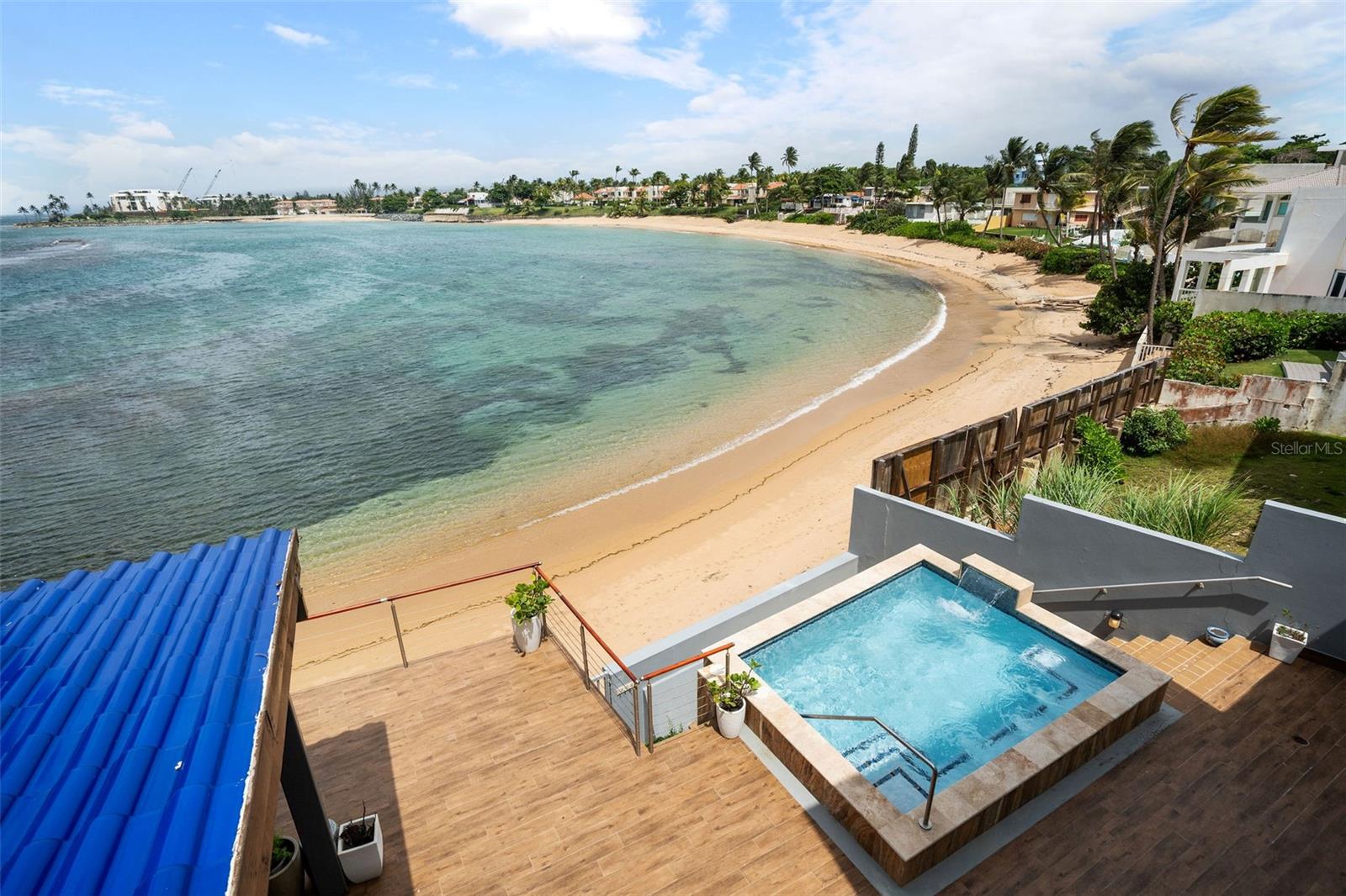 Awaken every day to the soothing symphony of crashing waves in this beachfront home within the private community of Breñas Estates. This remarkable 4-bedroom, 4.5 bathroom with direct access to the beach haven of Breñas Estates is now available to rent. The home features two primary bedrooms, one in the first floor and in the second floor with a large terrace, both with ocean views. And two additional rooms with en-suite bathrooms. Numerous lounging areas provide ample space for a large family looking for relaxation while taking in the ocean views from every corner. The living space opens up to a large terrace with covered space and a heated salt water pool, perfect way to watch sunset. Just a couple steps more you can ascend directly into the sand and pristine water of this secluded cove.
Breñas Estates offers 24-hour security and it's only a few minutes drive to Dorado supermarkets and restaurants, and for those with resort memberships, golf cart access is permitted through the members office. The home is equipped with a full power generator, providing uninterrupted power supply.
Numerous lounging areas, both indoors and outdoors, provide ample space for relaxation, unwinding and reveling in the breathtaking beach views.
while watching the surfing and kite boarding in the distance, indulge in the luxurious heated saltwater pool, or take a leisurely stroll along the pristine, practically secluded, sandy beach.
this residence boasts a warm modern design and is equipped with all the amenities promising an unforgettable living experience. This expansive private compound with over 5,000 sq ft is located within a secure gated community, offering 24-hour security for your peace of mind.
is a private gated beachfront community discretely nestled next to the Caribbean’s most renowned destination- Dorado Beach Resort. This long standing tight knit community has been a mainstay for generations of second home puertorican residents looking for a beach front private compound, without the bustle of resorts. The community comprises single family homes with families using the almost secluded cove as their backyards. The second floor lounging area has a kitchenette area for refreshments, while guests enjoy a movie, work, read or even exercise whilst taking in a breathtaking ocean view, and revel in beautiful sunsets. The home has an incredible four car garage with ample space for guests to park within the compound, and it is equipped with a 30KW Diesel generator which is also available, providing uninterrupted power supply and a solar water heater with electric backup.
