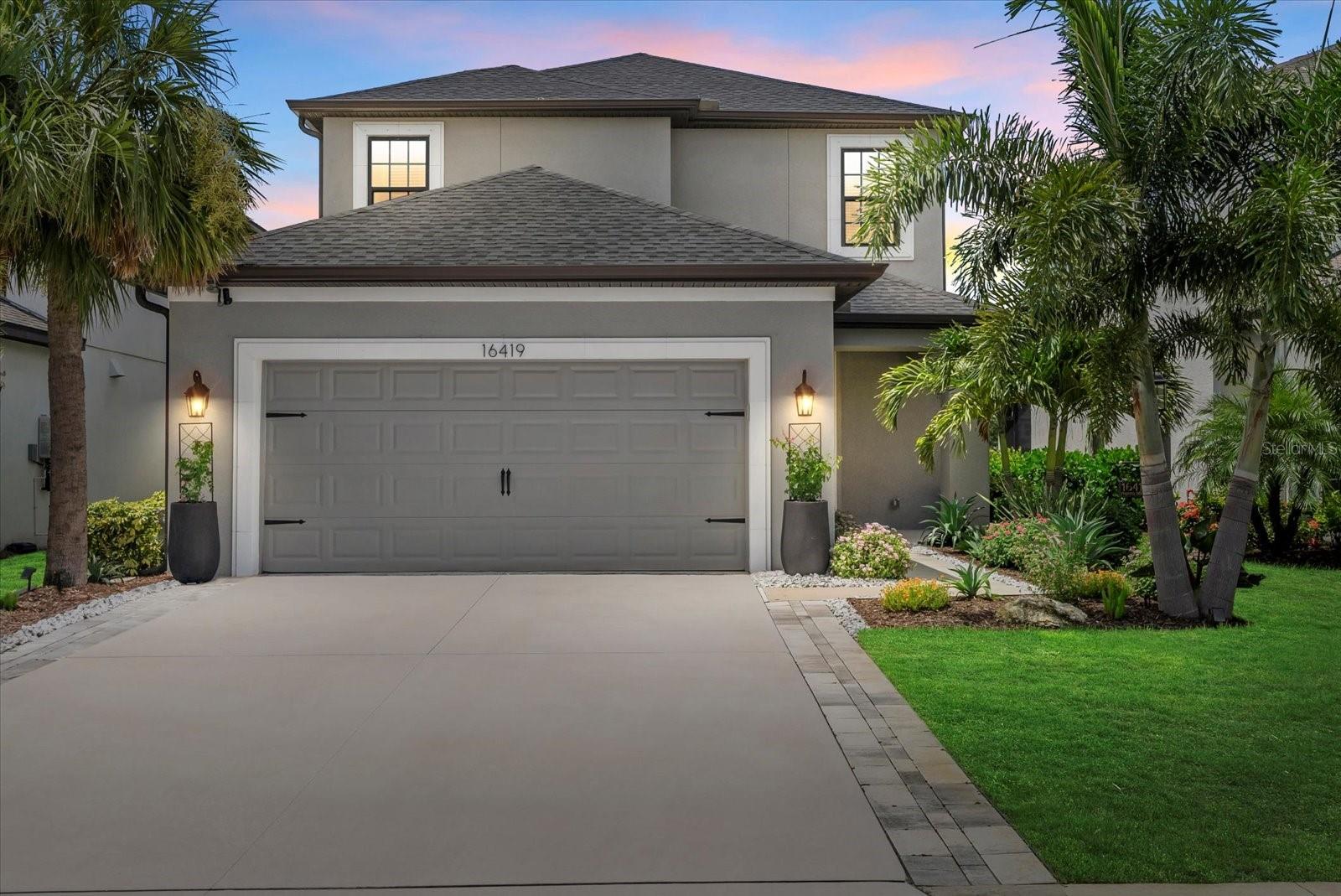 Prepare to be spellbound by this exceptional 5-bedroom, 3.5-bathroom home with a den, and loft nestled within the highly desirable Park East community at Azario in Lakewood Ranch. This exquisite abode seamlessly blends elegance and comfort throughout its spacious living areas and well-appointed bedrooms, all amplified by the grandeur of high ceilings and 8-foot doors.
The home's versatile floor plan offers ample space for every need. The first floor boasts a den or office space for remote work or personal retreats. Upstairs, you'll find a flexible loft area and a generously sized bonus room, perfect for a media center, play area, or additional living space.
The first-floor primary suite is a true haven of relaxation, complete with an ensuite bathroom designed for ultimate rejuvenation. Upstairs, you'll find three additional bedrooms, one of which includes its own ensuite, ensuring comfort and privacy for family or guests.
At the heart of this residence lies the stunning gourmet kitchen, where culinary masterpieces are created amidst crisp white cabinetry and a stylish breakfast bar. This chef's dream features an apron sink, under-cabinet lighting, lighted glass-front accent cabinets with a pull-out bar shelf, and pull-out drawers under the stove top. All kitchen cabinets and drawers are equipped with soft-close mechanisms.
No detail has been overlooked in this home's extensive upgrades, which include 5-inch baseboards, metal stair railings, a stunning glass front door, and various tile, counter, and flooring upgrades throughout. Functionality meets style with insulated garage doors, upper cabinets in the laundry room, and window trim added in the dining and master bedroom. Step outside through the pocket sliding glass door to the lanai and enjoy the upgraded landscaping within your private, fenced-in retreat.
Within Park East at Azario, you'll find an array of enticing amenities, from the breathtaking community pool to volleyball and basketball courts, dog parks, sports fields, and playgrounds. As part of Lakewood Ranch, this exceptional home is situated within a vibrant lifestyle that boasts world-class golf courses, premier shopping and dining options, top-notch medical facilities, and esteemed schools, including a new Lake Manatee VPK-8th grade building coming in 2025-2026. Enjoy convenient access to award-winning beaches, downtown Sarasota, University Town Park, Main Street, and I-75.
Don't miss your chance to make this extraordinary residence yours – contact us today to schedule a private tour!
