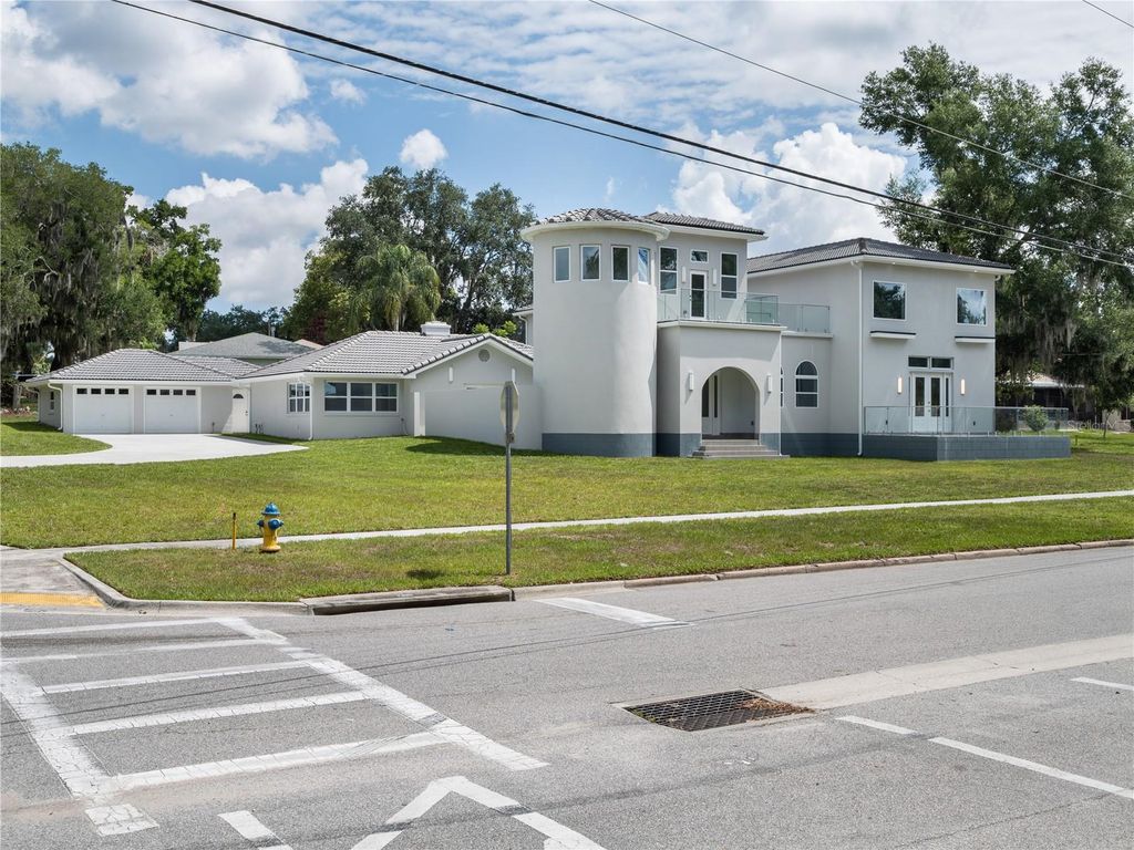 Photo of 1190 W Lakeshore Drive, Clermont, FL 34711 (MLS # O6416887)