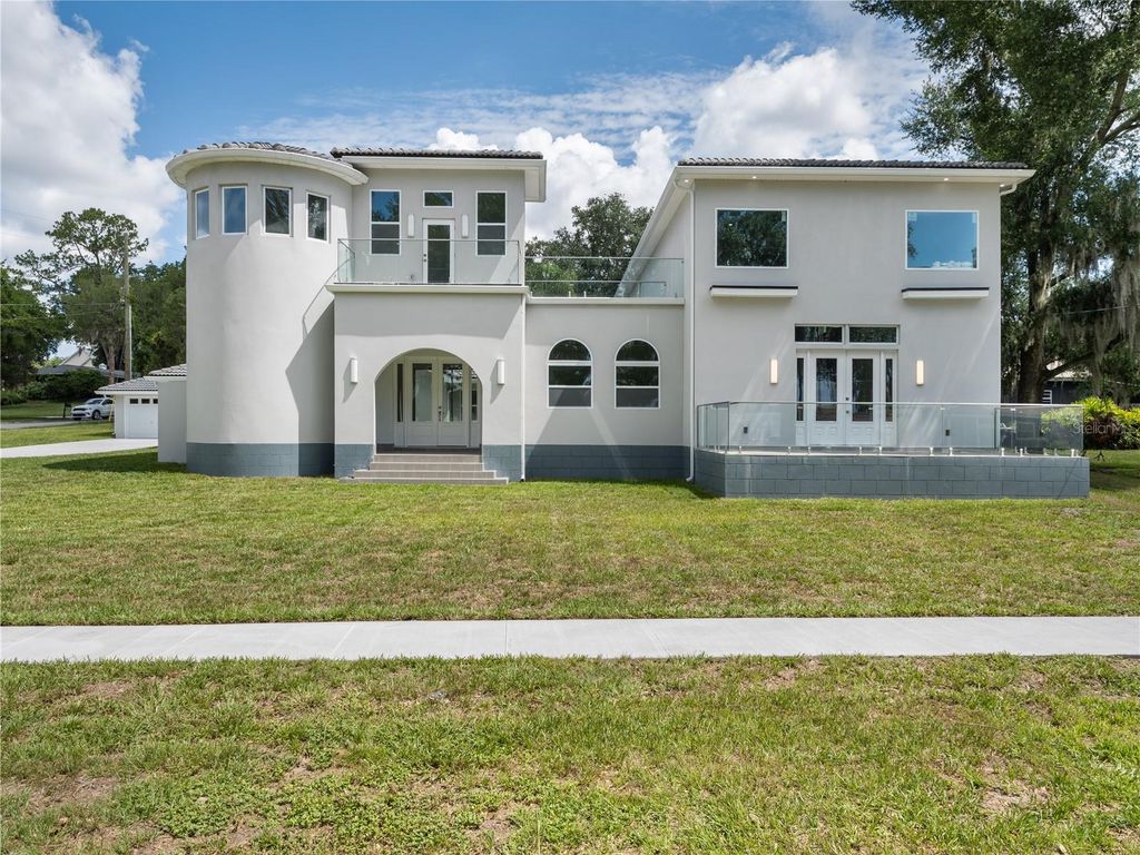 Photo of 1190 W Lakeshore Drive, Clermont, FL 34711 (MLS # O6416887)