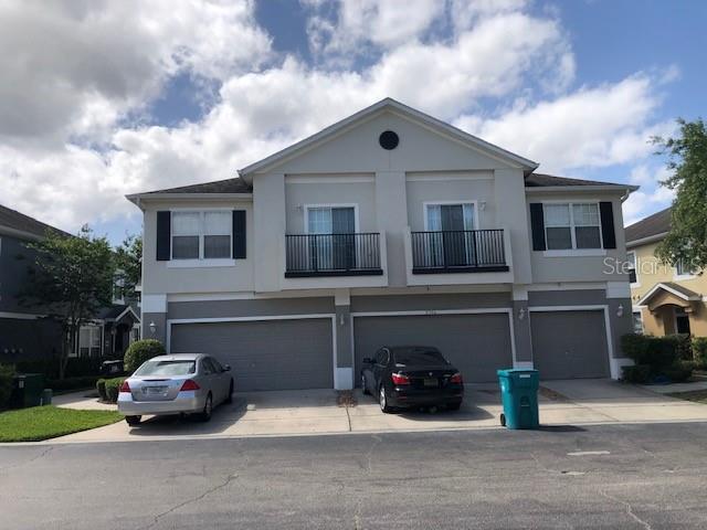 Exceptionally well maintained 2-story townhouse style condo in the desirable GATED community of Carter Glen! This 3 bedroom, 2.5 bath home with a 2-car attached garage offers 1,544 SqFt of comfortable living space. The first floor features large ceramic tile throughout the kitchen, great room, dining area, utility room, and half bath. You'll love the open floor plan with high ceilings, the kitchen with stainless steel appliances and double-door refrigerator, and wood cabinets. Upstairs all bedrooms and baths have beautiful LUXURY VINYL PLANK flooring (NO CARPET!) Primary ensuite bath has garden tub and double vanities. Top notch community amenities include clubhouse and fitness center, resort-style pool overlooking the lake, BBQ grills, playground, sand volleyball, and walking trails. Fabulous location - Just 10 minutes to Orlando International Airport, 2 traffic lights from Lee Vista Promenade, shopping & dining a minute away, only a couple of miles to Lake Nona. Zoned for EXCELLENT SCHOOLS. Available November 6th, 2025