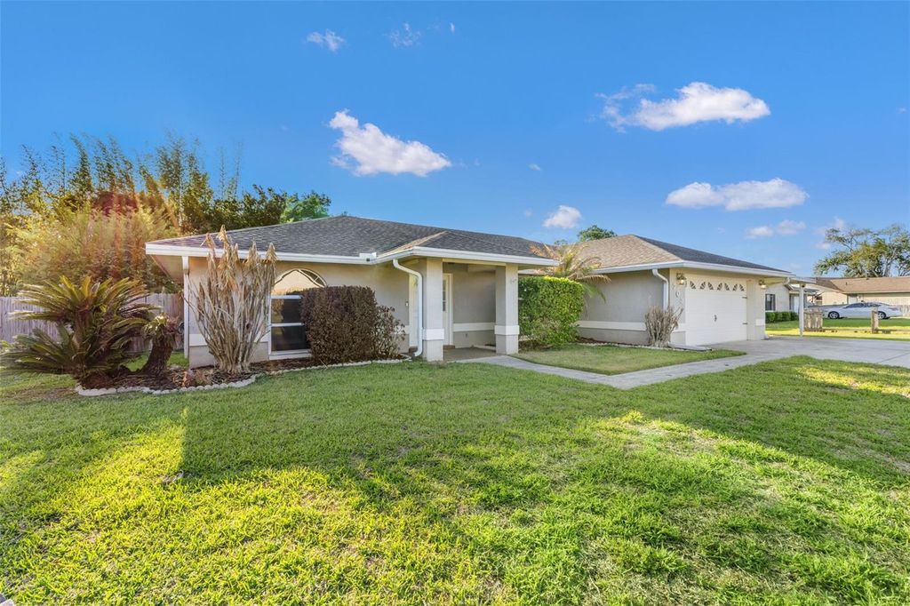 Photo of 703 Scott Lake Village Vlg S, Lakeland, FL 33813 (MLS # TB8493269)