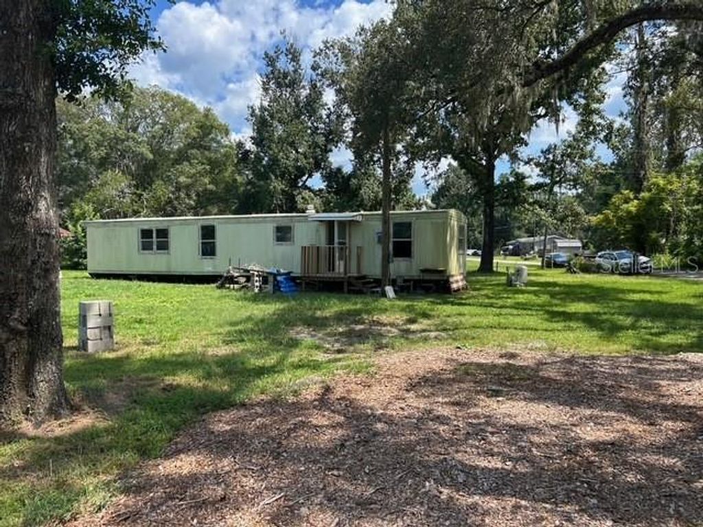 Photo of 17455 Sandlewood Avenue, Brooksville, FL 34604 (MLS # TB8438812)