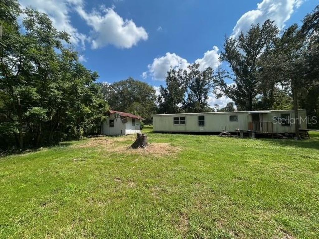 Photo of 17455 Sandlewood Avenue, Brooksville, FL 34604 (MLS # TB8438812)