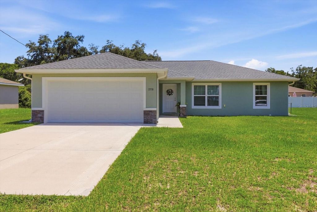 Photo of 13730 SW 102nd Street, Dunnellon, FL 34432 (MLS # TB8530386)