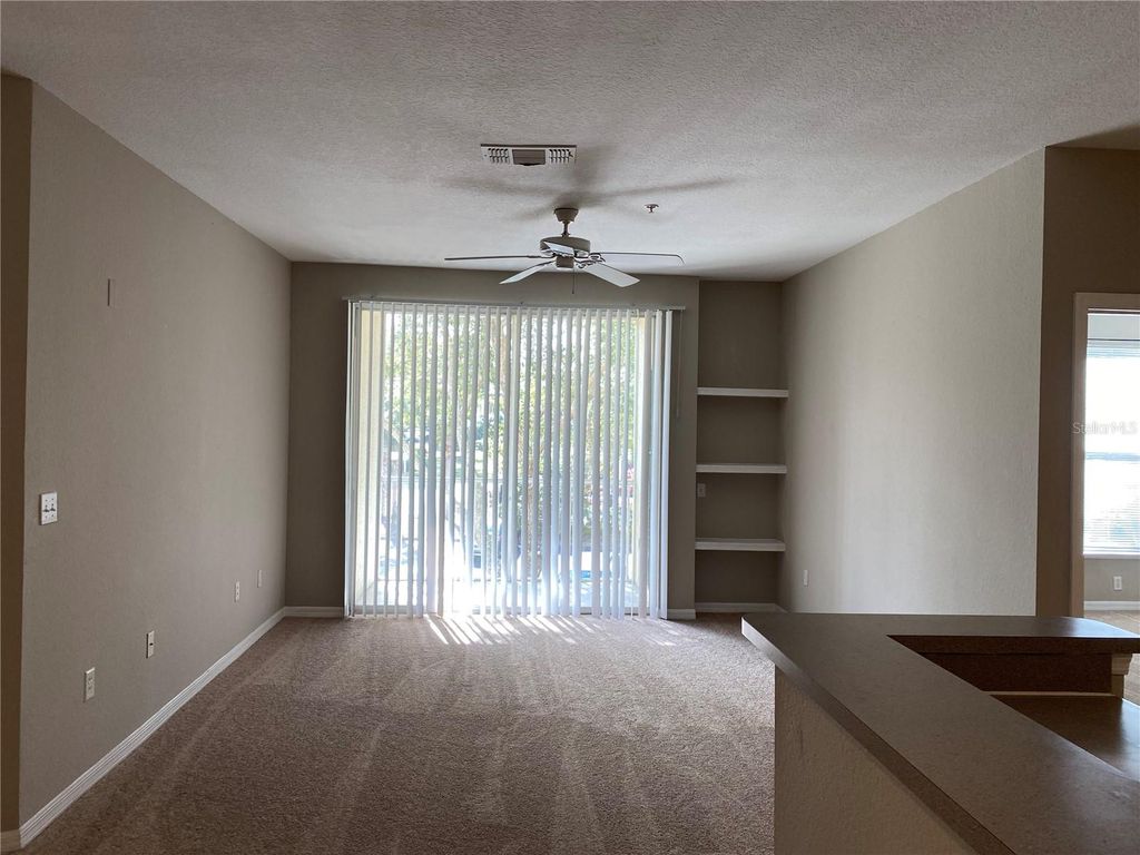 Photo of 8803 Dunes Court #4-205, Kissimmee, FL 34747 (MLS # O6357057)
