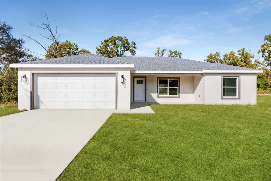 One or more photo(s) has been virtually staged. NO HOA and the BEST PRICED NEW CONSTRUCTION CONCRETE BLOCK HOME in the area. This property also qualifies for USDA financing with $0 down. Built by Corban Construction, a respected local builder with over 20 years of experience, this high-quality home features 3 bedrooms, 2 bathrooms, and a 2-car garage with an open-concept layout that seamlessly connects the kitchen, dining, and living areas.

Thoughtful upgrades include crown molding, a screened-in back porch, stainless steel appliances, cabinetry in the laundry room, a stylish kitchen backsplash, a floored attic space for additional storage, and a beautiful tray ceiling in the primary bedroom. The primary suite offers a private bathroom and a spacious closet, while the additional bedrooms provide generous space for family, guests, or a home office.

This home is move-in ready with energy-efficient construction, modern finishes throughout, and a 1-year home warranty for added peace of mind.

Located less than a mile from Lake Weir, you are just minutes from waterfront dining at Gator Joe’s and Eaton’s Beach, along with shopping, parks, and outdoor recreation. Schedule your showing today.