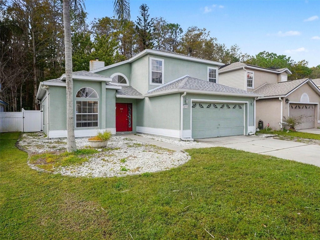 Photo of 10728 Spring Brook Lane, Orlando, FL 32825 (MLS # O6453255)