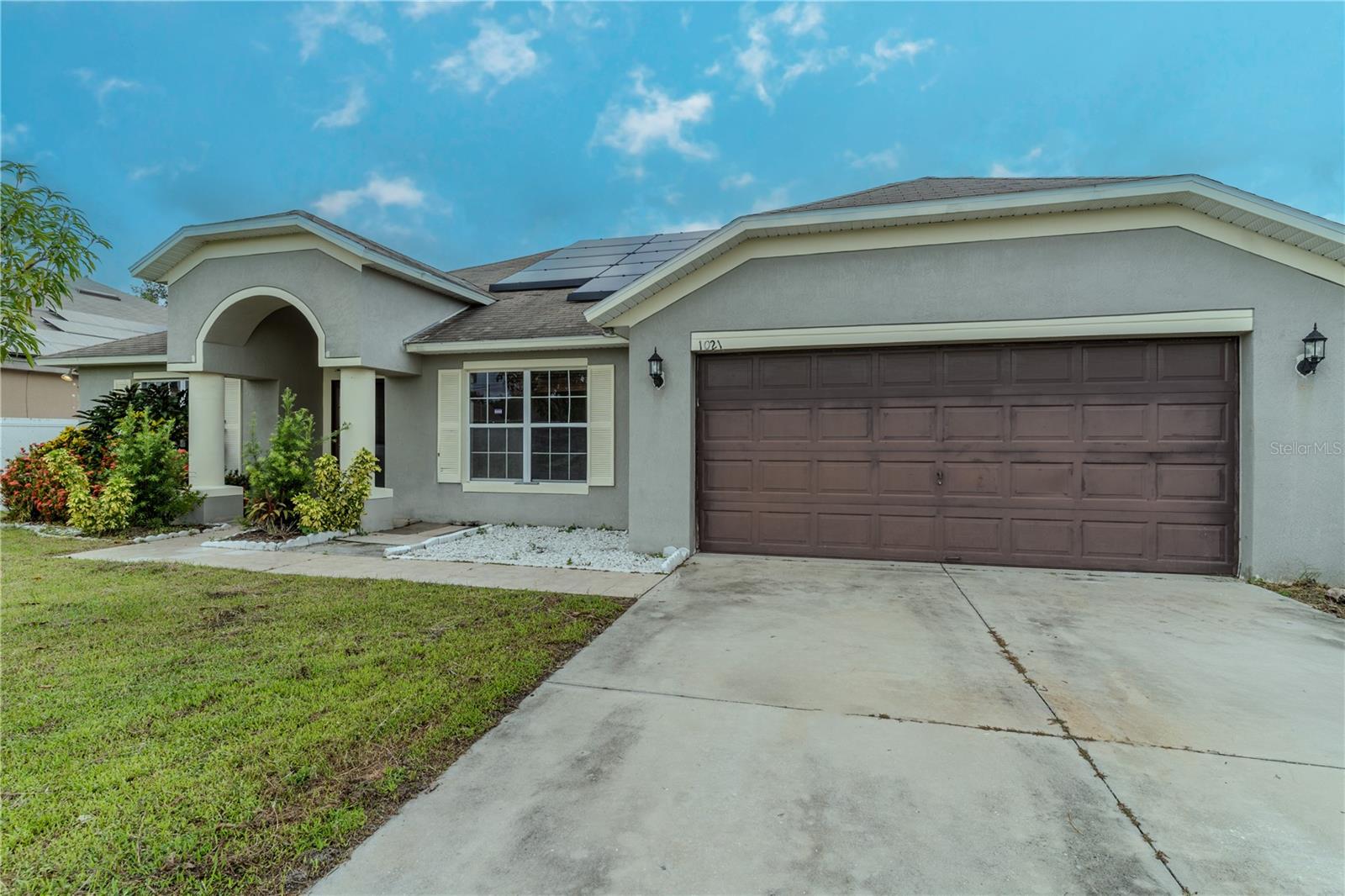 Welcome to your new home in Ponciana Villages! This lovely four-bedroom, three-bathroom house is located in a highly desirable community. As you enter, you’ll appreciate the open-concept layout that connects the living spaces, making it perfect for both relaxation and entertaining. The split bedroom design offers privacy for family members, while the formal dining room is great for meals together. The flexible formal living room can serve as an office or flex family area, depending on your needs. The spacious kitchen features a central island and breakfast bar, along with stainless steel appliances that make cooking a pleasure. The large primary bedroom includes an en suite bathroom with a tiled shower and garden tub, plus a large walk-in closet and private water closet for added convenience. The entire home has beautiful tile flooring, with cozy laminate in the bedrooms, and large windows throughout let in plenty of natural light. Step outside through the sliding glass doors to a expansive concrete porch, perfect for enjoying your morning coffee or evening relaxation. The backyard also has a handy storage shed for all your outdoor tools. Living in Ponciana Villages means you’ll have access to great amenities like a clubhouse, fitness center, playground, park, pool, recreational ball court, and tennis courts, so there’s always something to do. Plus, you’ll be close to major highways, schools, shopping, and local attractions. Don’t miss your chance to make this wonderful home your own—schedule a viewing today!