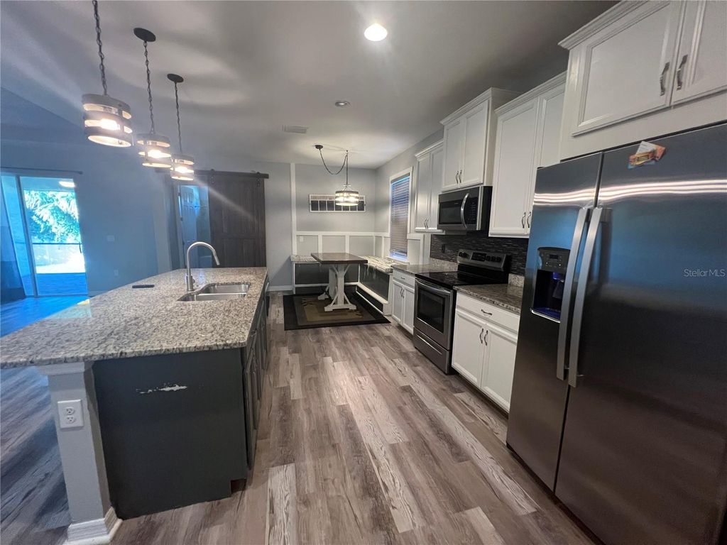Photo of 10487 Atenia Street, Port Charlotte, FL 33981 (MLS # C7515433)