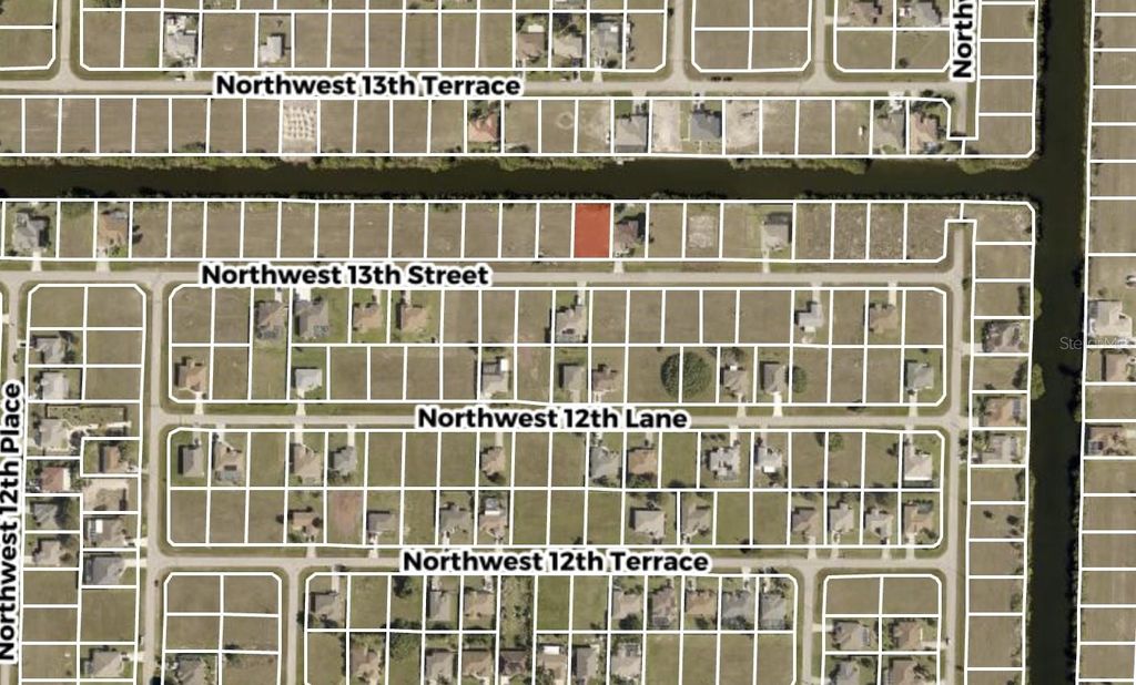 Photo of 1023 NW 13th Street, Cape Coral, FL 33993 (MLS # GC531743)