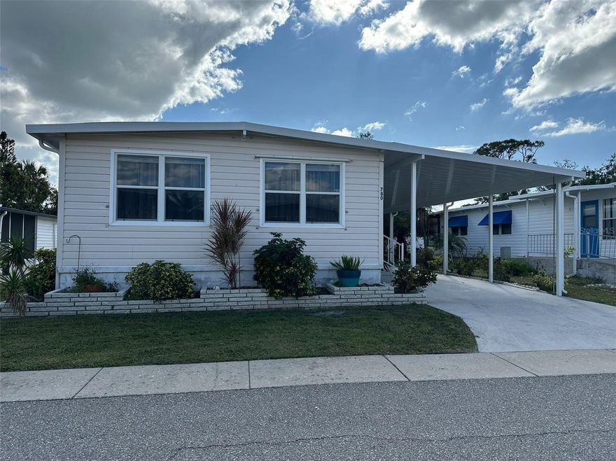 This beautiful two bedroom, two bathroom unit is located in Japanese Gardens. Less than 2 miles from Manasota Beach, Japanese Gardens is a popular 55+ community with many activities and amenities. This home sits on the perimeter of the community in the dog friendly section of the park. No neighbors behind you! The home features new luxury plank vinyl flooring throughout with plywood subfloors, new vapor barrier, new roof over, new lanai roof, new carport and carport tie downs, and new lighting fixtures. It is beautiful and move in ready!