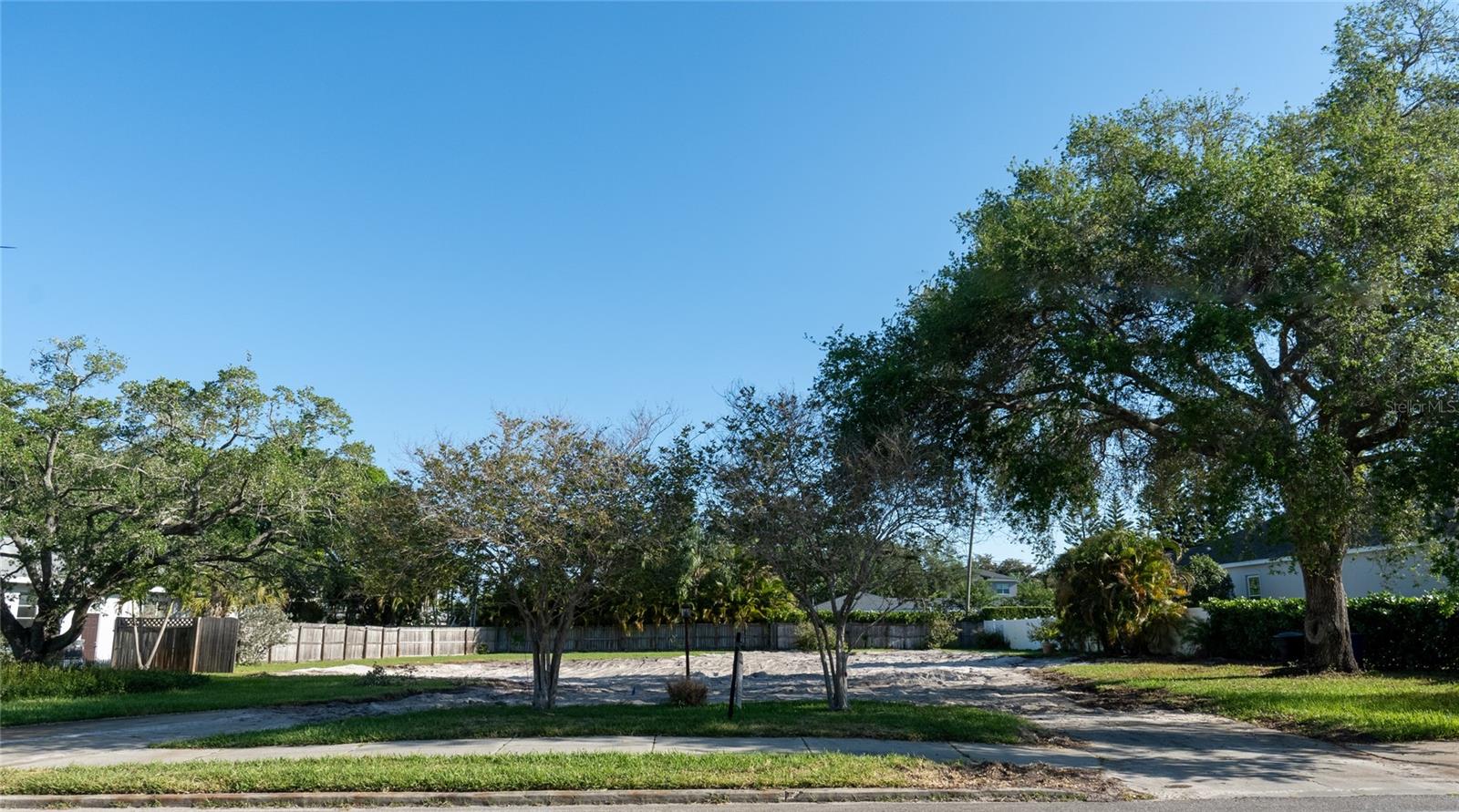Introducing a truly exceptional and exceedingly rare once in a lifetime opportunity to own a double lot of unparalleled prestige on the coveted Snell Isle, nestled adjacent to the picturesque Vinoy Golf Course. This remarkable estate sized piece of land boasts an effective lot size that stretches an impressive 124 feet by 151 feet, providing a continuous expanse of 18,724 square feet of prime land. Here lies the canvas upon which you can paint the masterpiece of your dreams, a chance to craft the ultimate home that perfectly suits your desires. The sheer size of this double lot presents a unique opportunity, with potential to build not just one but two luxurious dream homes, setting the stage for a lifestyle of unparalleled sophistication and comfort. Situated in the heart of this glamorous neighborhood, you'll find yourself in close proximity to the vibrant downtown St. Petersburg, which offers a wealth of cultural, dining, and entertainment options. This location seamlessly combines the tranquility of Snell Isle with the vibrancy of city living, offering the best of both worlds. For the discerning developer, this double lot represents an exceptional investment prospect, with the potential to build two luxurious homes.