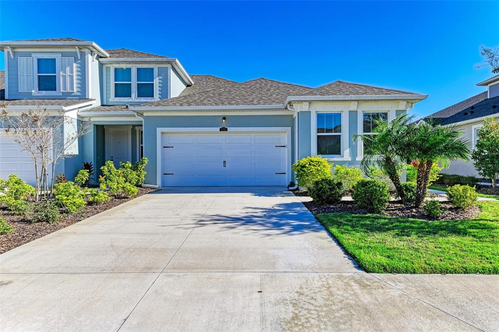 HERE IT IS !!! THIS RARELY AVAILABLE MAINTENANCE-FREE SEMI-DETACHED END UNIT VILLA BUILT IN 2020 WITH BEAUTIFUL PRESERVE VIEWS! Really Nice open floor plan which includes 2 bedrooms, 2 full baths, and a 2-car garage with a screened in lanai on a PRESERVE lot. The kitchen offers 42" Cabinets, Quartz counters, Stainless Steel appliances, and a Counter Island. The dining area and kitchen are open to view the airy great room with an abundance of Florida sunshine. The split bedroom plan offers a peaceful owner's suite with a spacious Walk-In Closet, and a private bathroom with Dual Sink Vanity, Linen Closet, and an oversized Shower. The second bedroom is located at the front of the villa and adjacent to the second full bath which offers privacy to your guests. Enjoy the upgraded plank flooring throughout the main villa. The screened in lanai off the kitchen extends your living space while enjoying your private preserve view. 2 car garage and more !!! Harmony is central located in the heart of Lakewood Ranch/Bradenton and the community offers Maintenance-free lawn care, resort style pool, fitness center, entertainment room, and a playground. Lakewood Ranch is an award winning Master Planned community which has A-rated schools, close to shops, restaurants, hospitals, trails, and tons of outdoor activities. Only a short ride to beautiful Gulf Beaches ! See this Beauty today !!! HARMONY is in close proximity to shopping, medical, and Rt 75 !!!