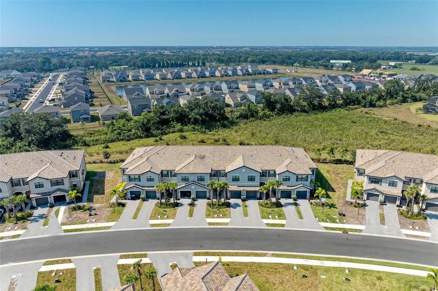 Step into luxury, lifestyle, and leisure within the sought-after guard-gated community of Lorraine Lakes, where resort amenities and maintenance-free living redefine everyday comfort. This townhome offers the perfect blend of modern design and low-maintenance luxury in the heart of Lakewood Ranch.

The bright, open-concept main floor welcomes you with elegant finishes, a spacious living room, and a kitchen that shines with stainless-steel appliances, plenty of storage, and sleek cabinetry that's perfect for both everyday living and effortless entertaining. Step outside to your private lanai, a peaceful retreat ideal for morning coffee or evening relaxation.

Upstairs, the spacious primary suite offers a tranquil escape with dual walk-in closets and an ensuite bath. Two additional bedrooms and a full bathroom provide versatility and comfort that are perfect for guests, hobbies, or a dedicated workspace.

Outside your door, enjoy unparalleled amenities: a resort-style pool, state-of-the-art fitness center, sports courts, restaurant and bar, and scenic walking trails that capture the best of the Florida lifestyle. Whether you’re lounging poolside, joining a workout class, or meeting friends at the clubhouse, every day feels like a vacation.

Situated just minutes from boutique shopping, dining, golf courses, and the Gulf Coast’s stunning beaches, with convenient access to I-75 for easy commuting, Lorraine Lakes offers the perfect balance of luxury, connection, and convenience. This isn’t just a home - it’s your entry into the Lakewood Ranch lifestyle.