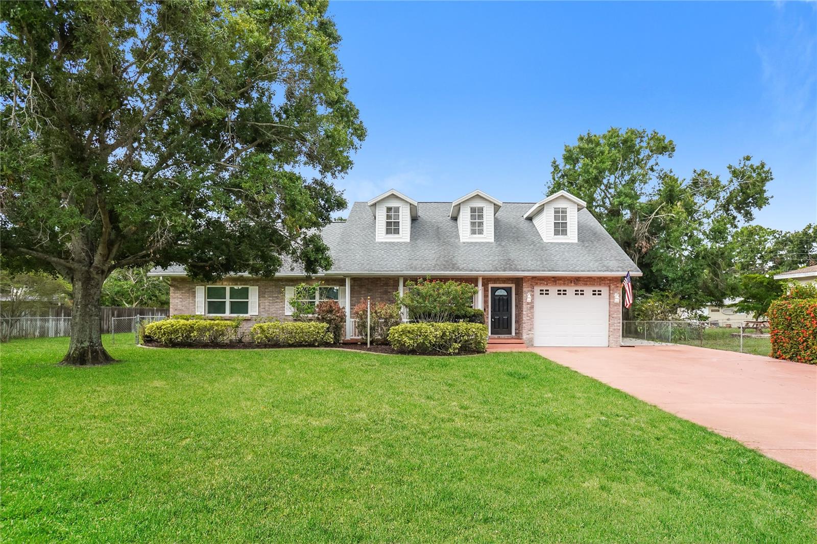 Freshly updated with full interior paint and new carpet, this 4-bedroom, 2-bath pool home offers comfort and style with a refreshed look throughout. The split floorplan provides privacy, while the spacious living room with a cozy fireplace is perfect for relaxing or entertaining. Enjoy the updated bathrooms, durable vinyl plank flooring, and a screened-in pool area ideal for year-round outdoor living. This move-in ready home is a must-see!