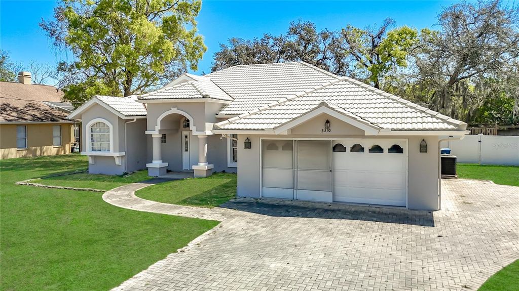 Photo of 3310 Deltona Blvd, Spring Hill, FL 34606 (MLS # W7884045)