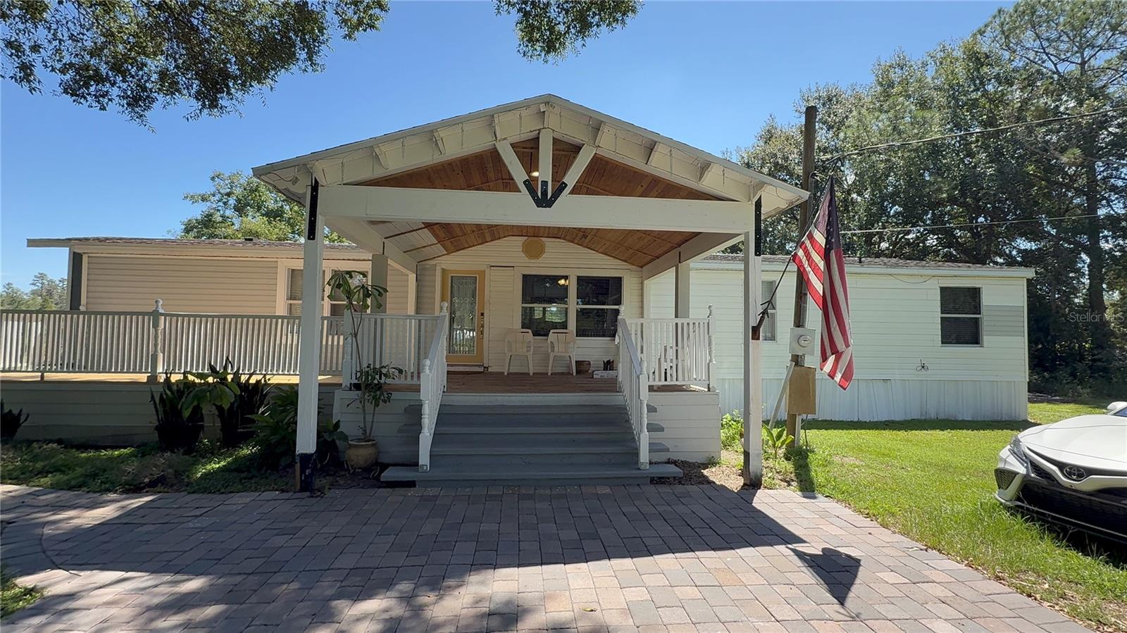 This excellent property on the Polk City land boasts 7.66 acres of open land for planting, raising, or general enjoyment. A peaceful place where enjoying nature and the peace of the place makes this the ideal location. This manufacturing home features unique adaptations, open spaces, and exclusive comfort. Call for a showing.