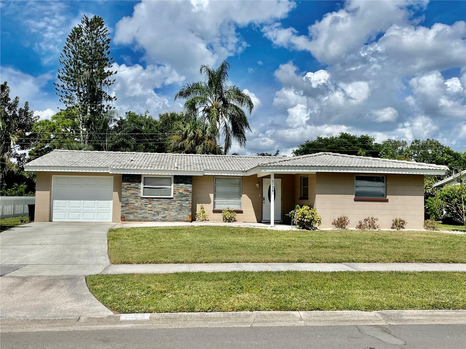 Beautifully updated and tastefully furnished two bedroom, two bath home in the lovely Gulf Gate Community in Sarasota. This home features a king bedroom and a queen bedroom, two full baths with a family room, sitting room with an adjacent office area that looks out to the stunning screened in porch and private backyard. This home is located on a Circle street with little traffic. Pets are allowed with a minimal pet fee. Enjoy this home as you await completion of your permanent home or spend a portion of the year in sunny Sarasota.