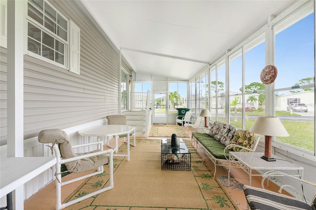 Photo of 7348 Swinton Ave, Port Charlotte, FL 33981 (MLS # C7518748)