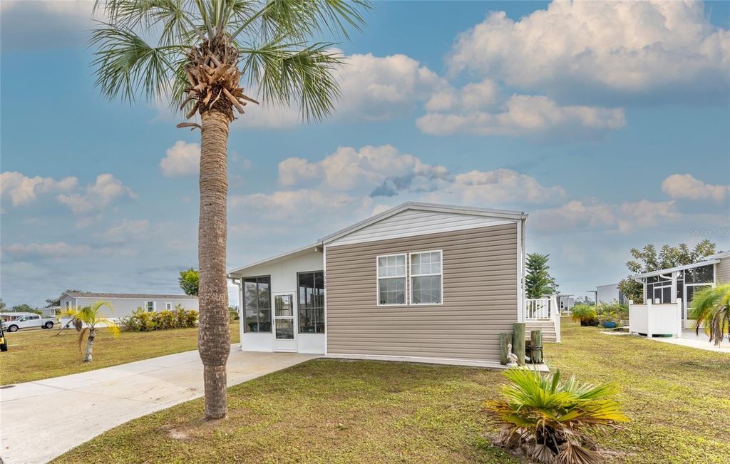 Photo of 7348 Swinton Ave, Port Charlotte, FL 33981 (MLS # C7518748)